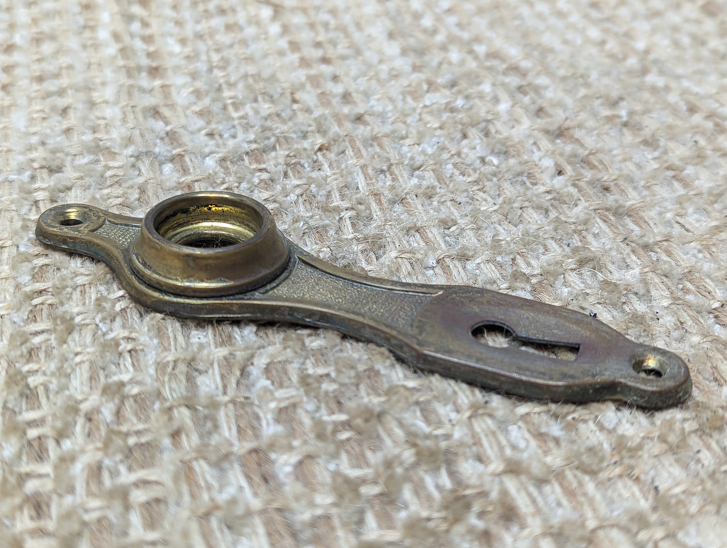 1 1/4" x 4 15/16" Antique Stamped Brass Door Knob Plate