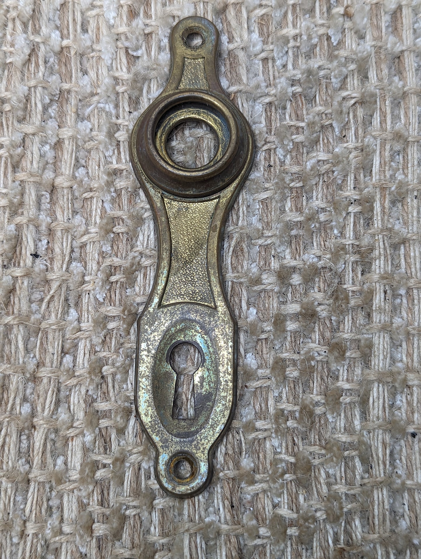 1 1/4" x 4 15/16" Antique Stamped Brass Door Knob Plate