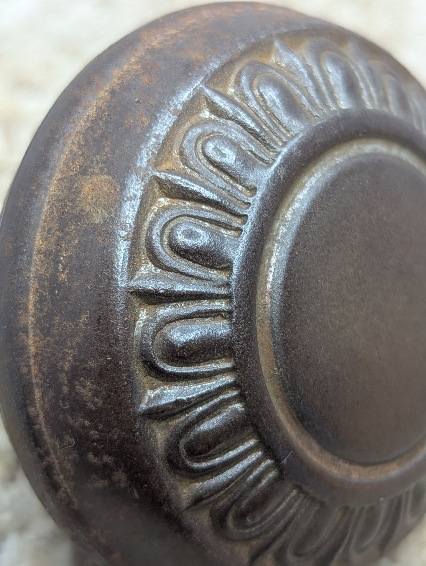2 1/4" Antique Egg & Dart Stamped Steel Door Knob