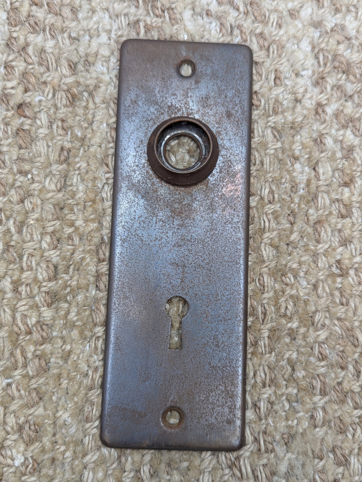 1 15/16" x 5 11/16" Antique Stamped Steel Door Knob Plate