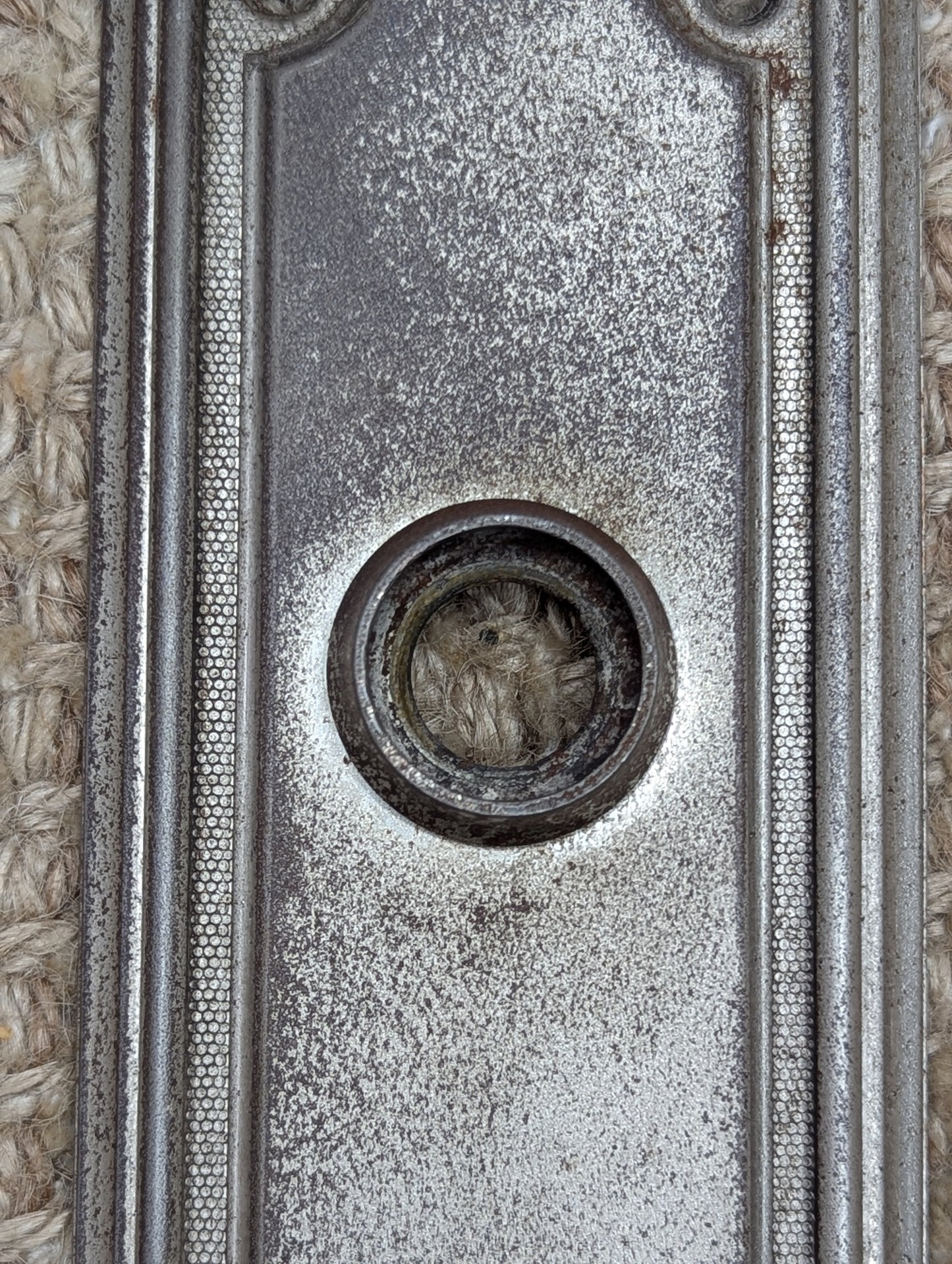2 3/8" x 7 1/4" Antique Stamped Steel Door Knob Plate