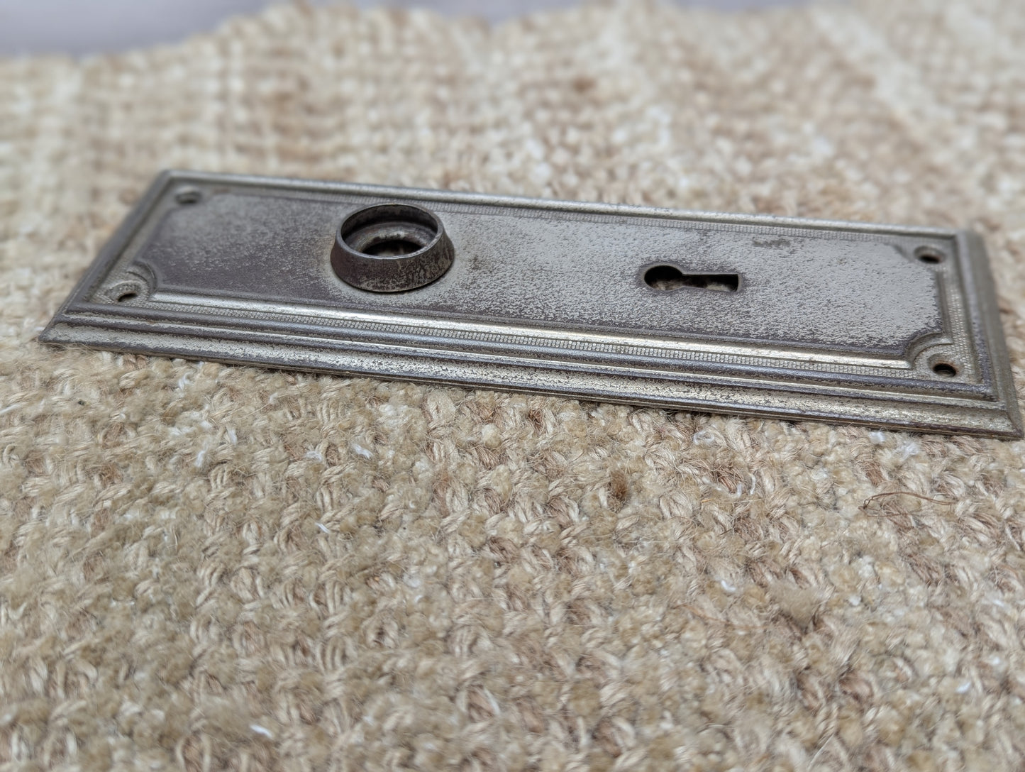2 3/8" x 7 1/4" Antique Stamped Steel Door Knob Plate