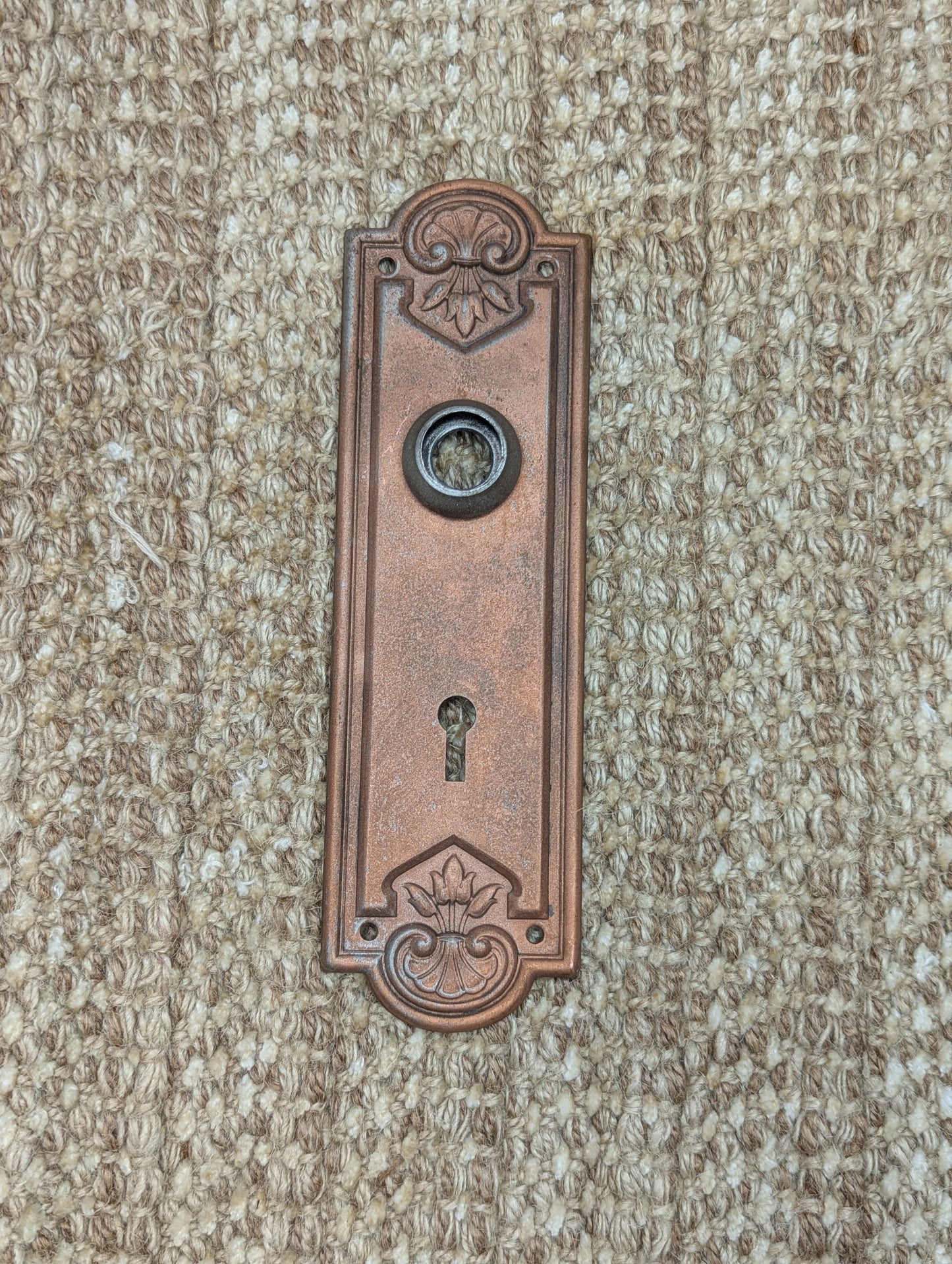 2 1/4" x 7 7/16" Antique Stamped Steel Door Knob Plate-Copper Finish