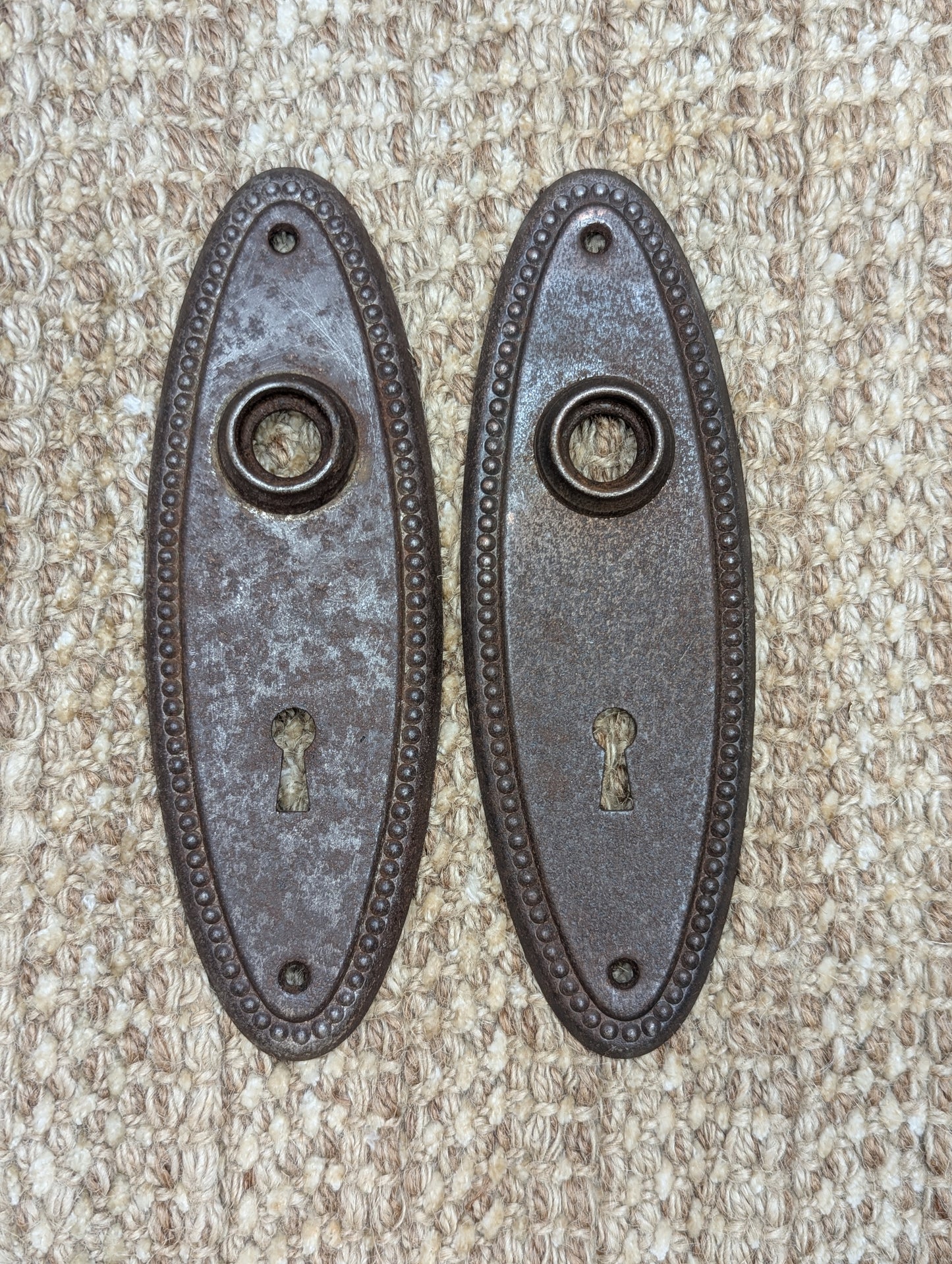 Pair Of 2 1/4" x 6 3/4" Antique Stamped Steel Door Knob Plates