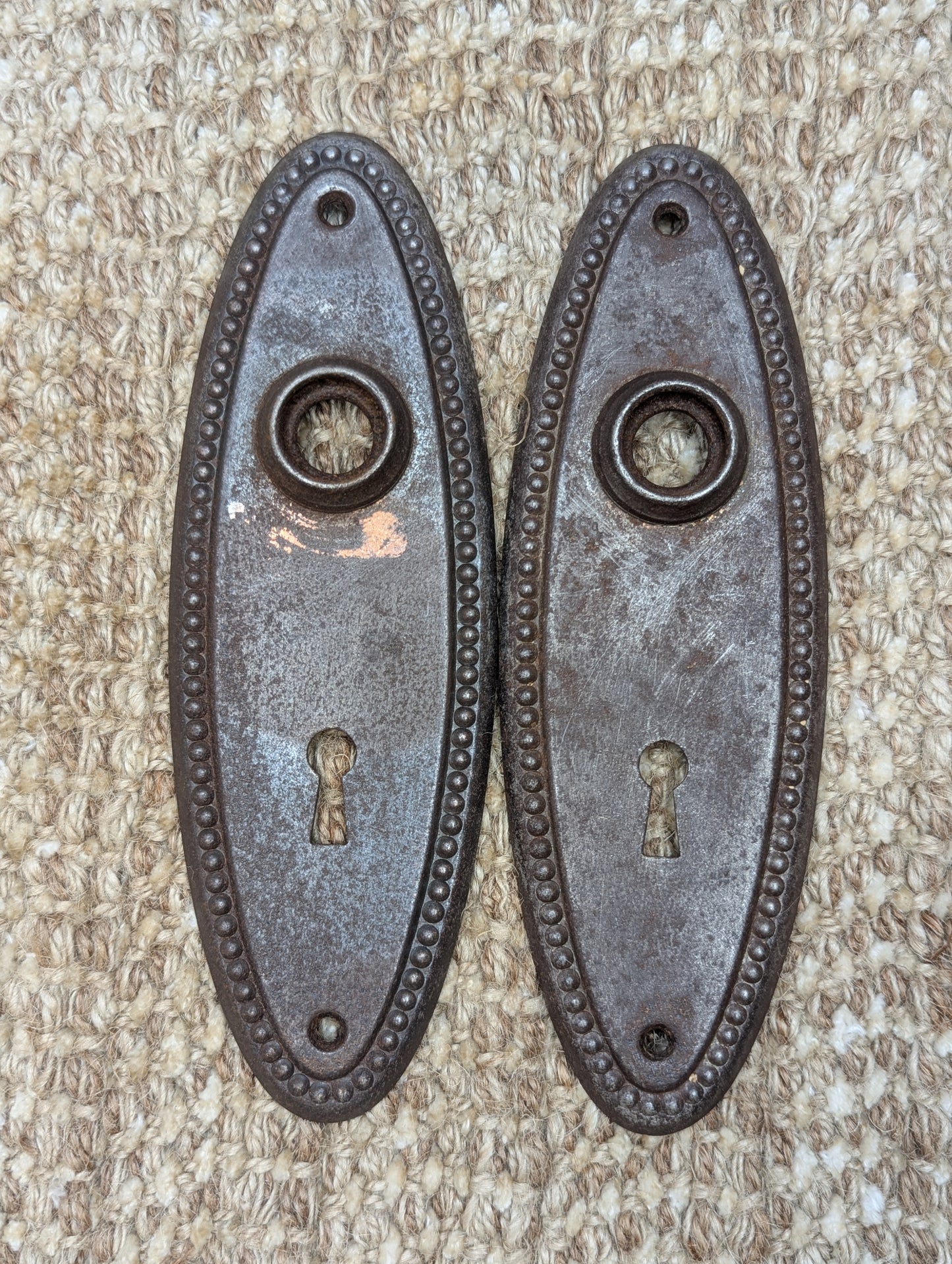 Pair Of 2 1/4" x 6 3/4" Antique Stamped Steel Door Knob Plates