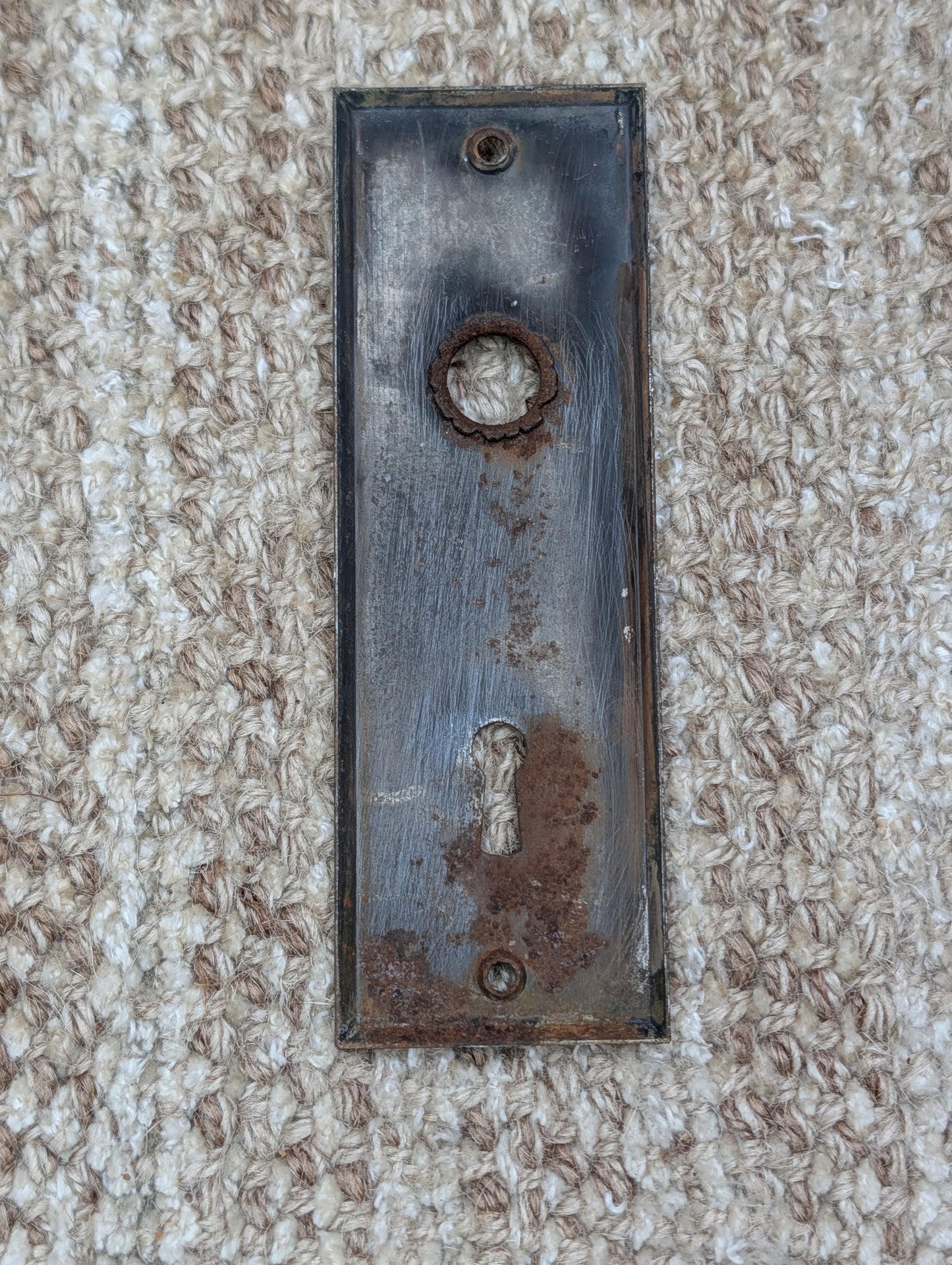 1 13/16" x 5 7/16" Antique Stamped Steel Door Knob Plate