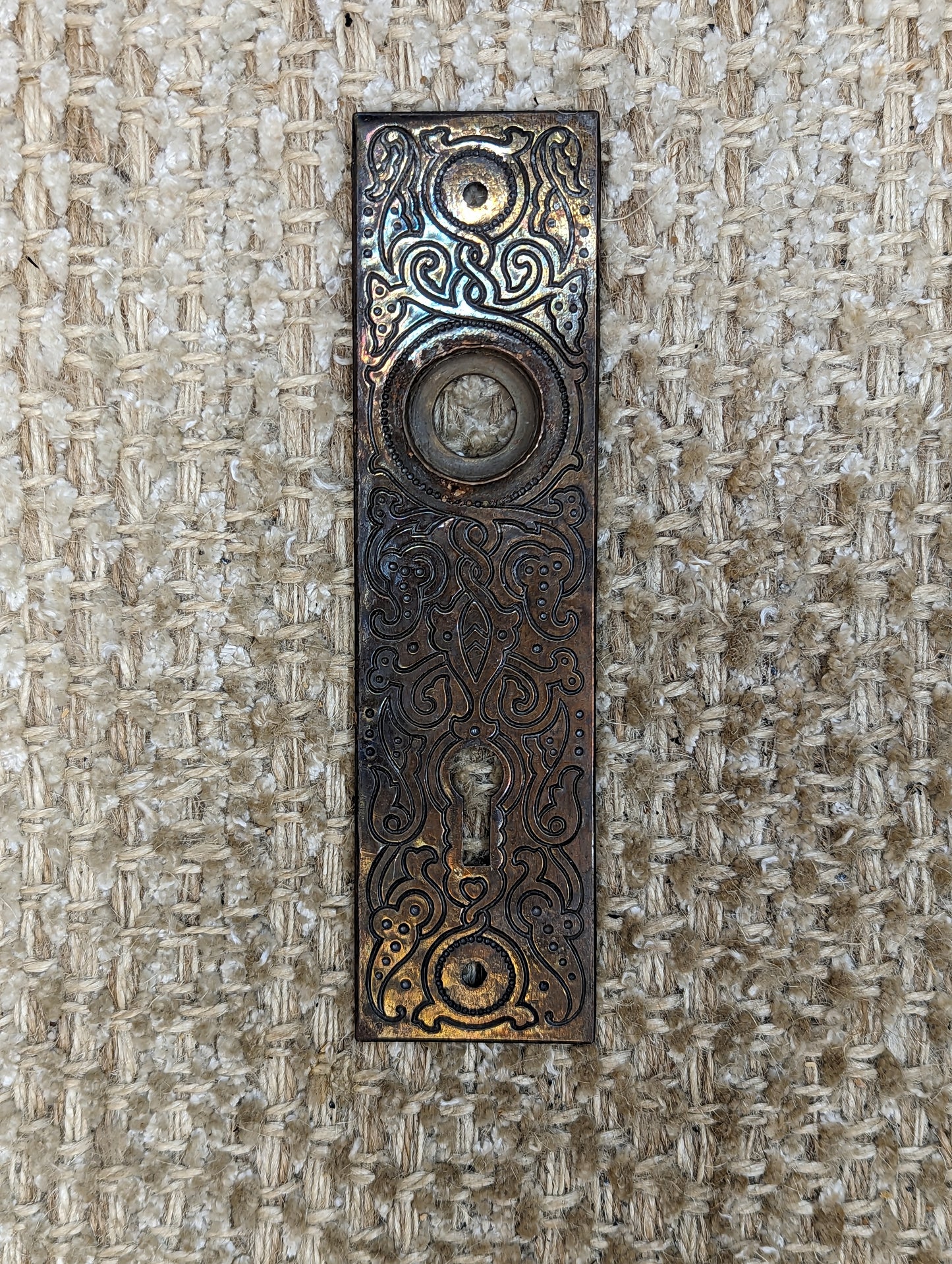 1 7/16" x 5 9/16" Antique Stamped Steel Door Knob Plate