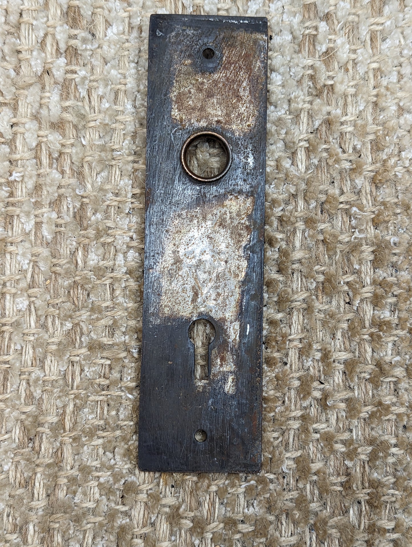 1 7/16" x 5 9/16" Antique Stamped Steel Door Knob Plate