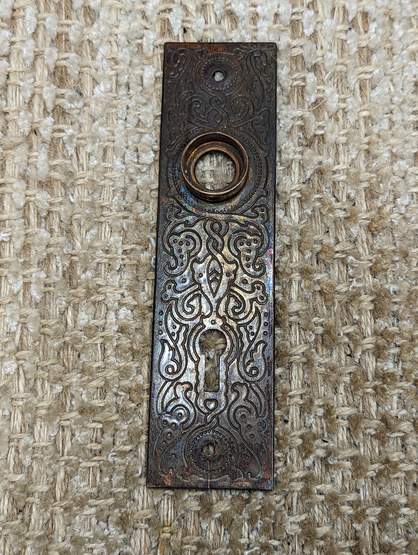 1 7/16" x 5 9/16" Antique Stamped Steel Door Knob Plate