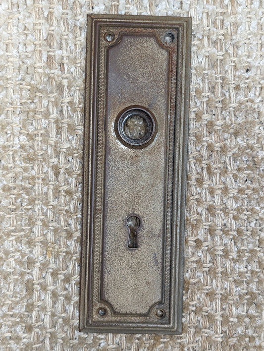 2 3/8" x 7 1/4" Antique Stamped Steel Door Knob Plate