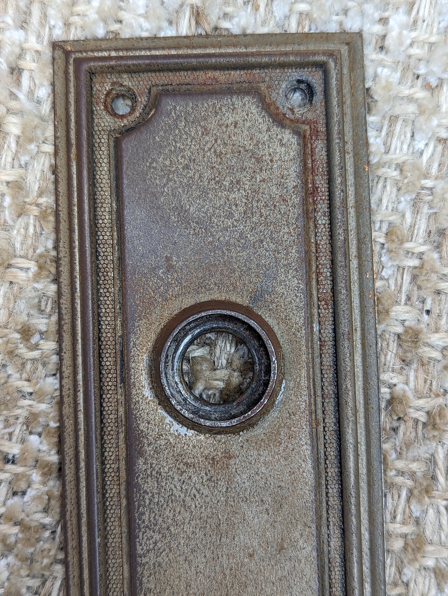 2 3/8" x 7 1/4" Antique Stamped Steel Door Knob Plate