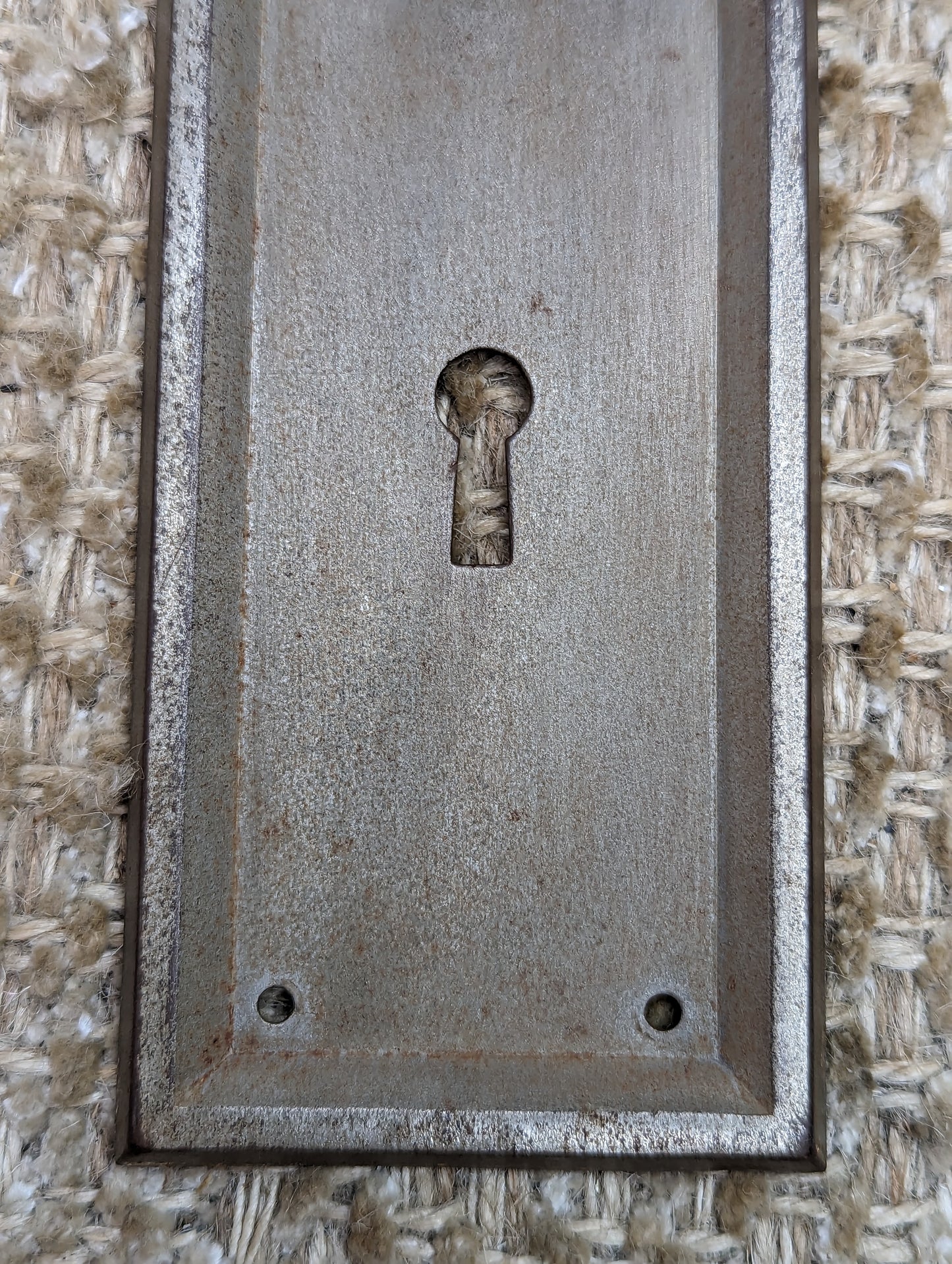 2 7/16" x 7 1/8" Antique Stamped Steel Door Knob Plate