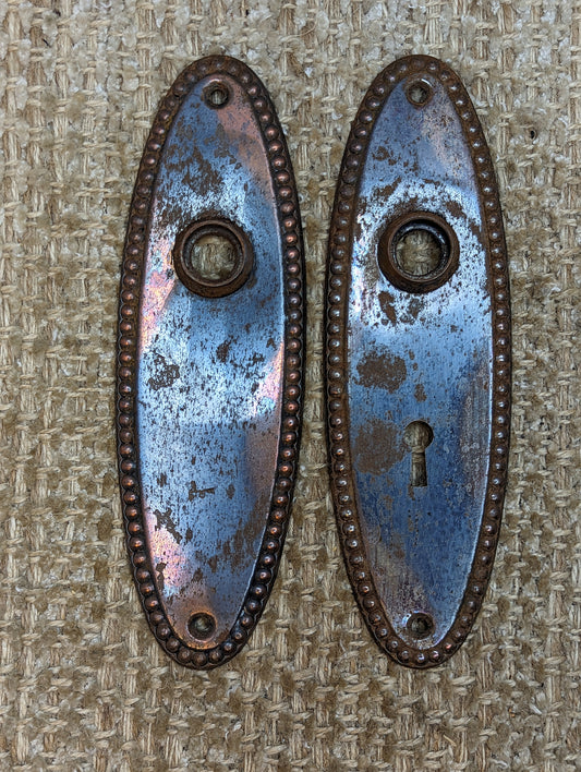 2 1/4" x 7 3/8" Pair Of Antique Stamped Steel Door Knob Plates