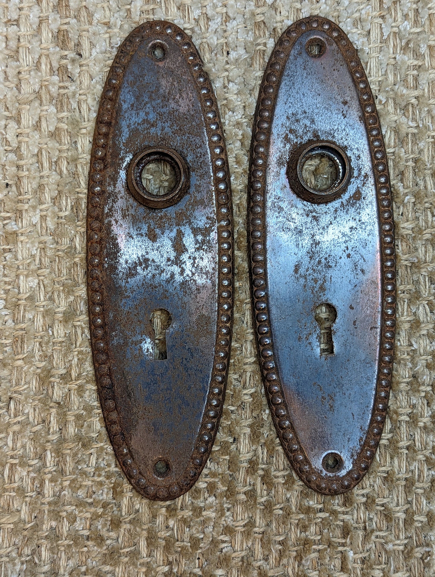 2 1/4" x 7 3/8" Pair Of Antique Stamped Steel Door Knob Plates