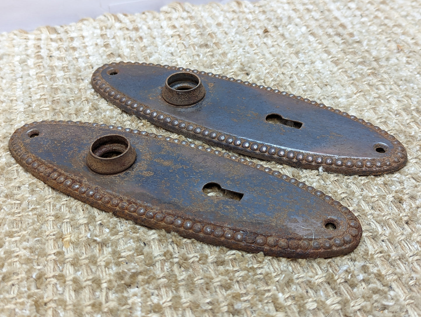 2 1/4" x 7 3/8" Pair Of Antique Stamped Steel Door Knob Plates