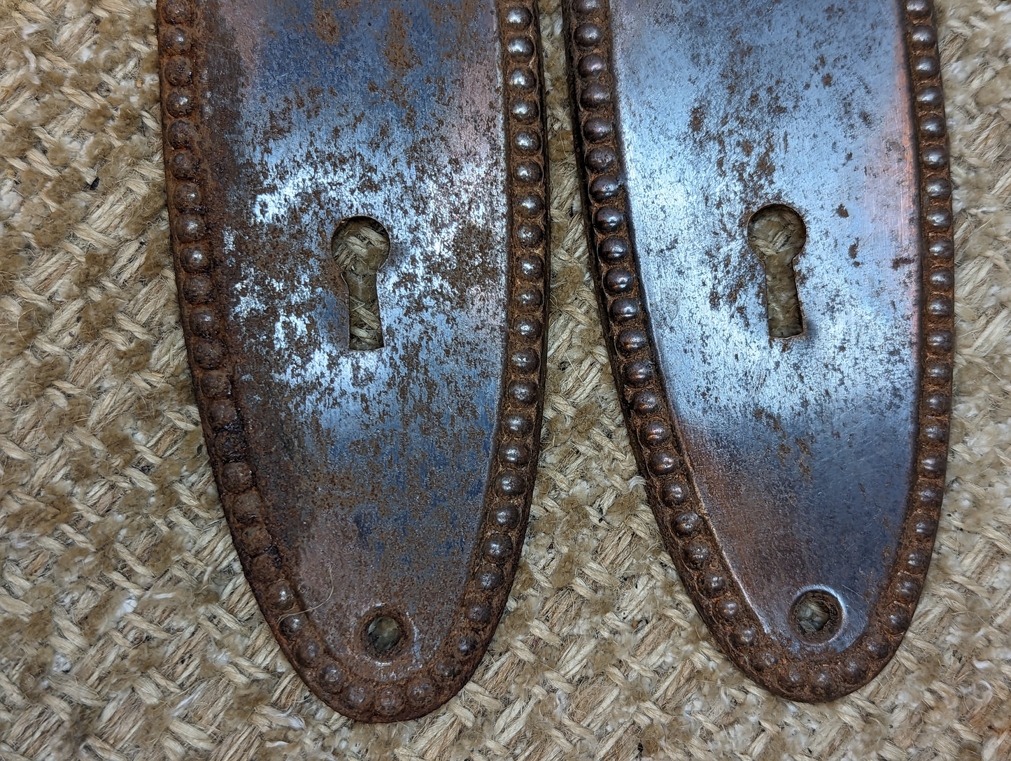 2 1/4" x 7 3/8" Pair Of Antique Stamped Steel Door Knob Plates