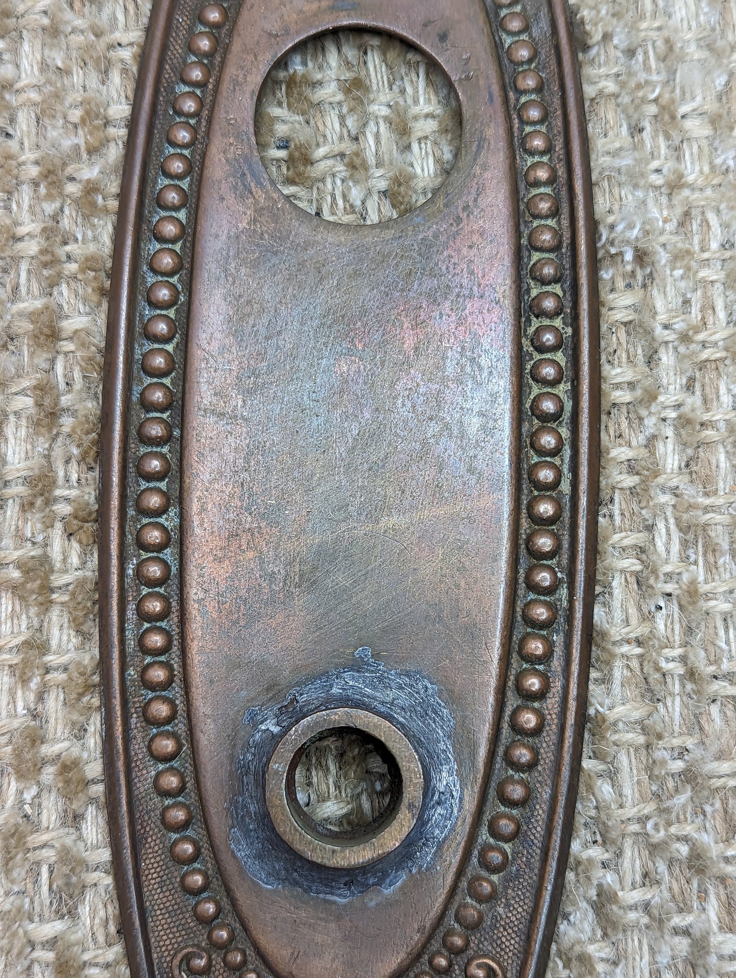 2 1/2" x 9" Antique Stamped Brass Door Knob Plate