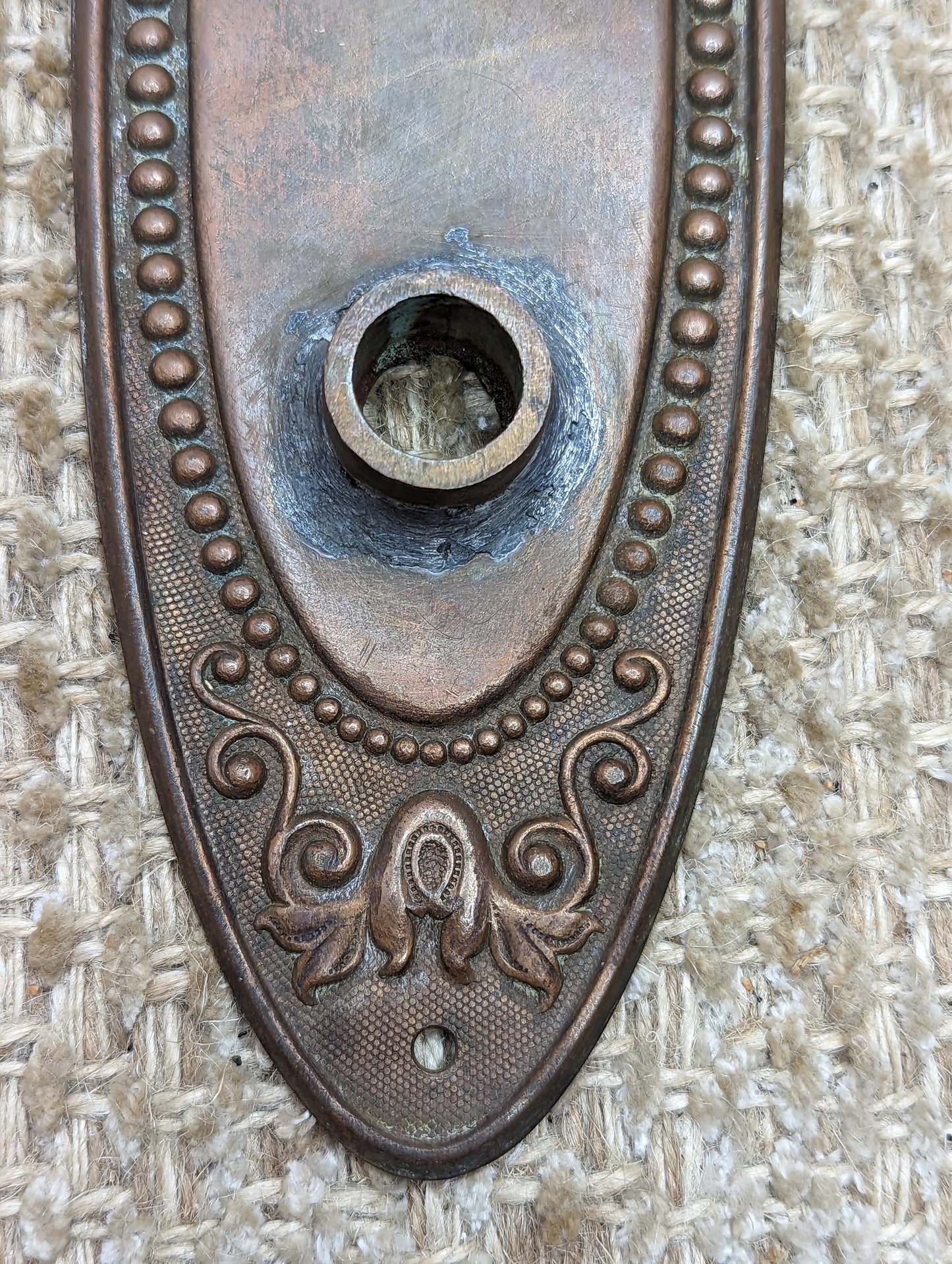 2 1/2" x 9" Antique Stamped Brass Door Knob Plate