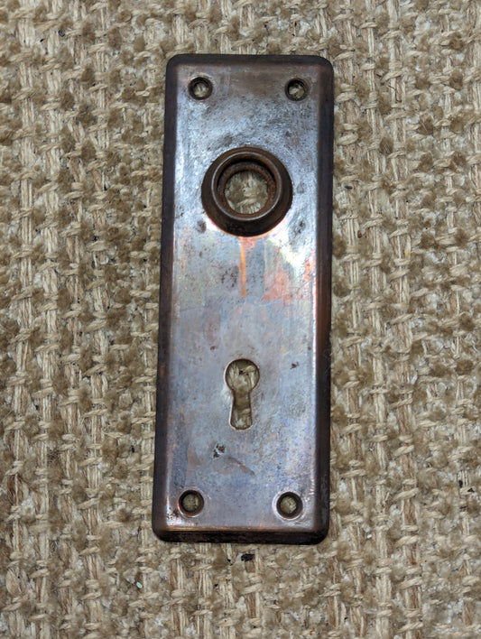 2" x 5 3/4" Antique Stamped Steel Door Knob Plate