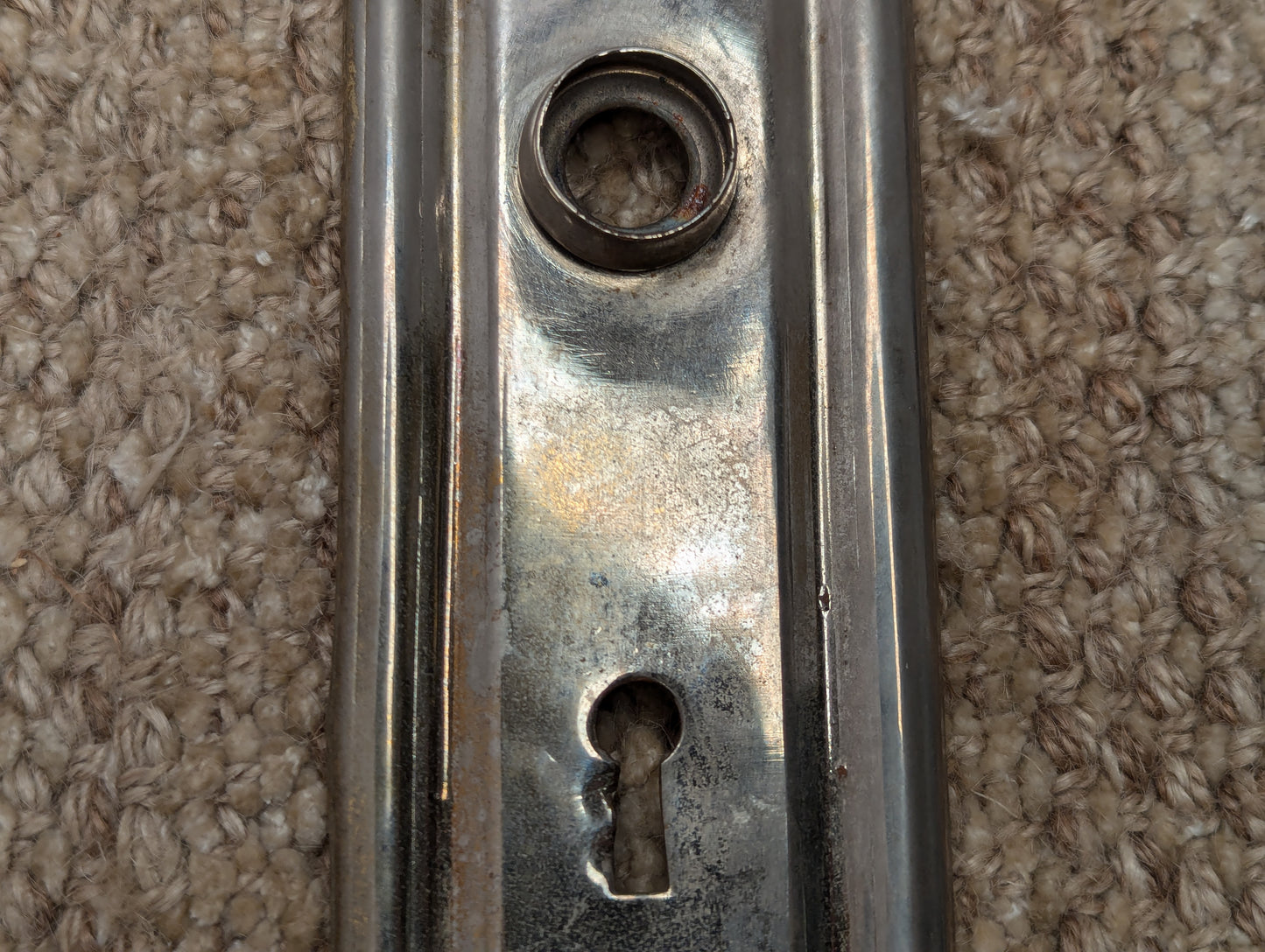 Antique 2 3/8" x 7 3/4" Steel Door Knob Plate