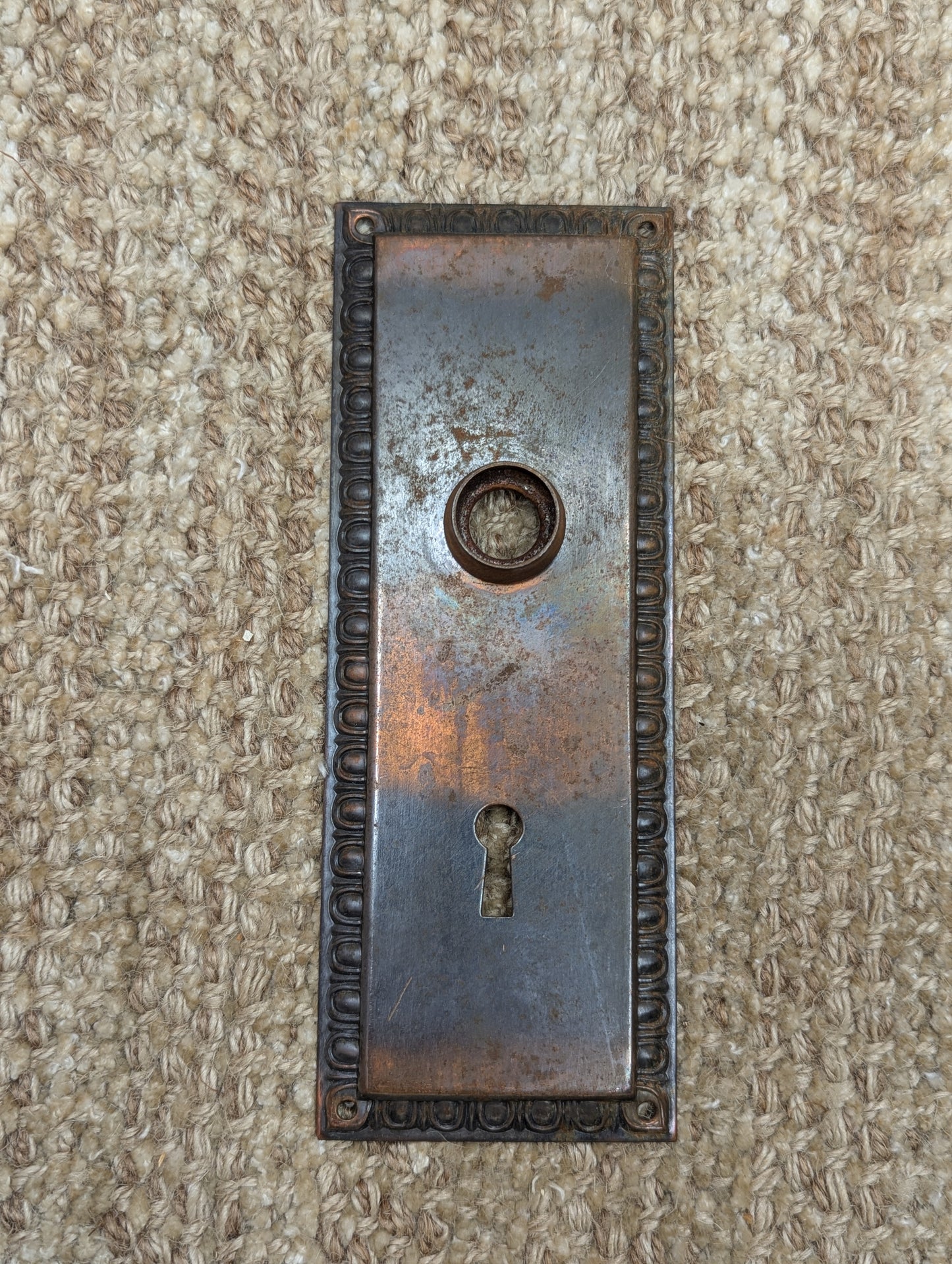 2 5/8" x 7" Antique Stamped Steel Door Knob Plate