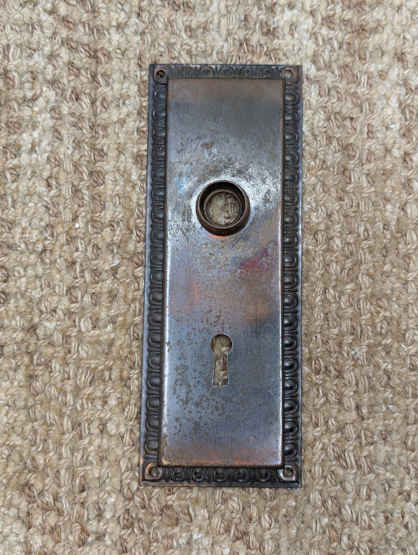 2 5/8" x 7" Antique Stamped Steel Door Knob Plate