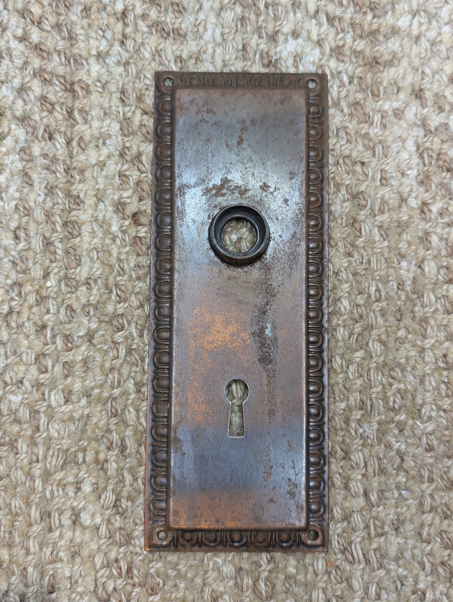 2 5/8" x 7" Antique Stamped Steel Door Knob Plate