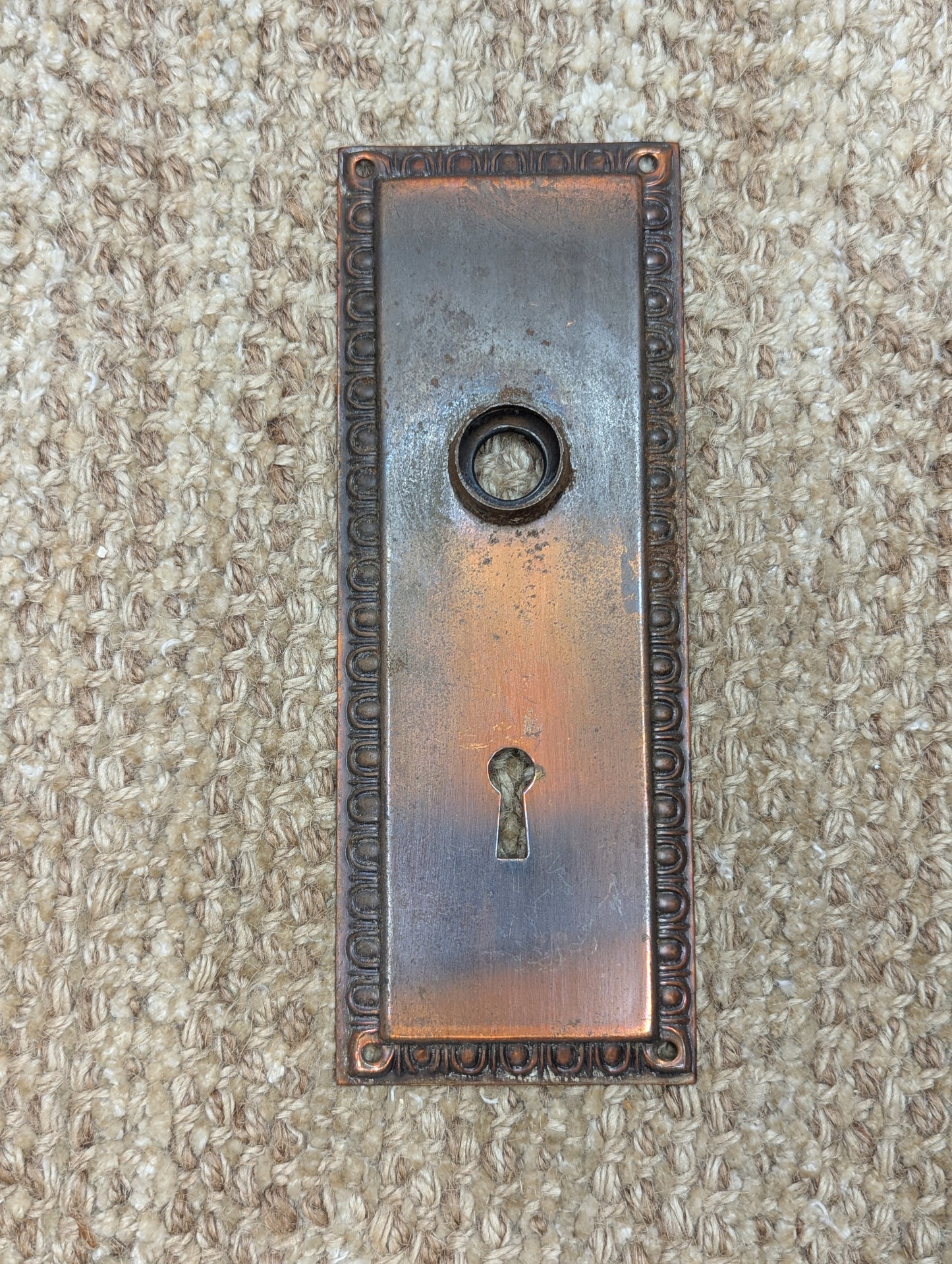 2 5/8" x 7" Antique Stamped Steel Door Knob Plate