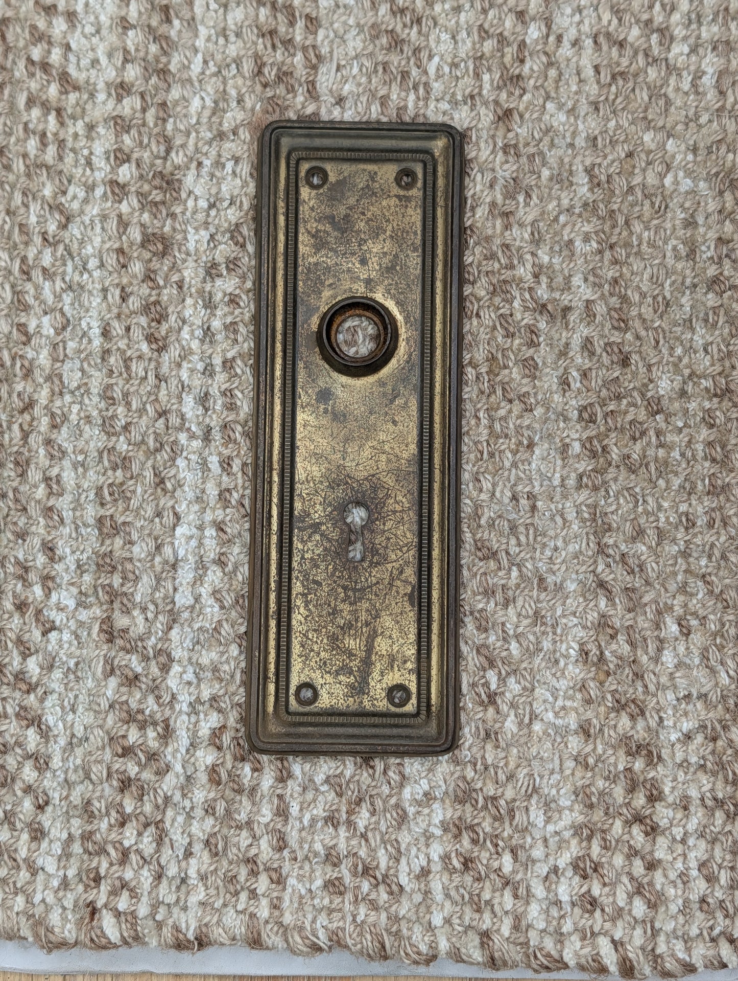 2 9/16" x 7 3/4" Antique Brass Plated Stamped Steel Door Knob Plate