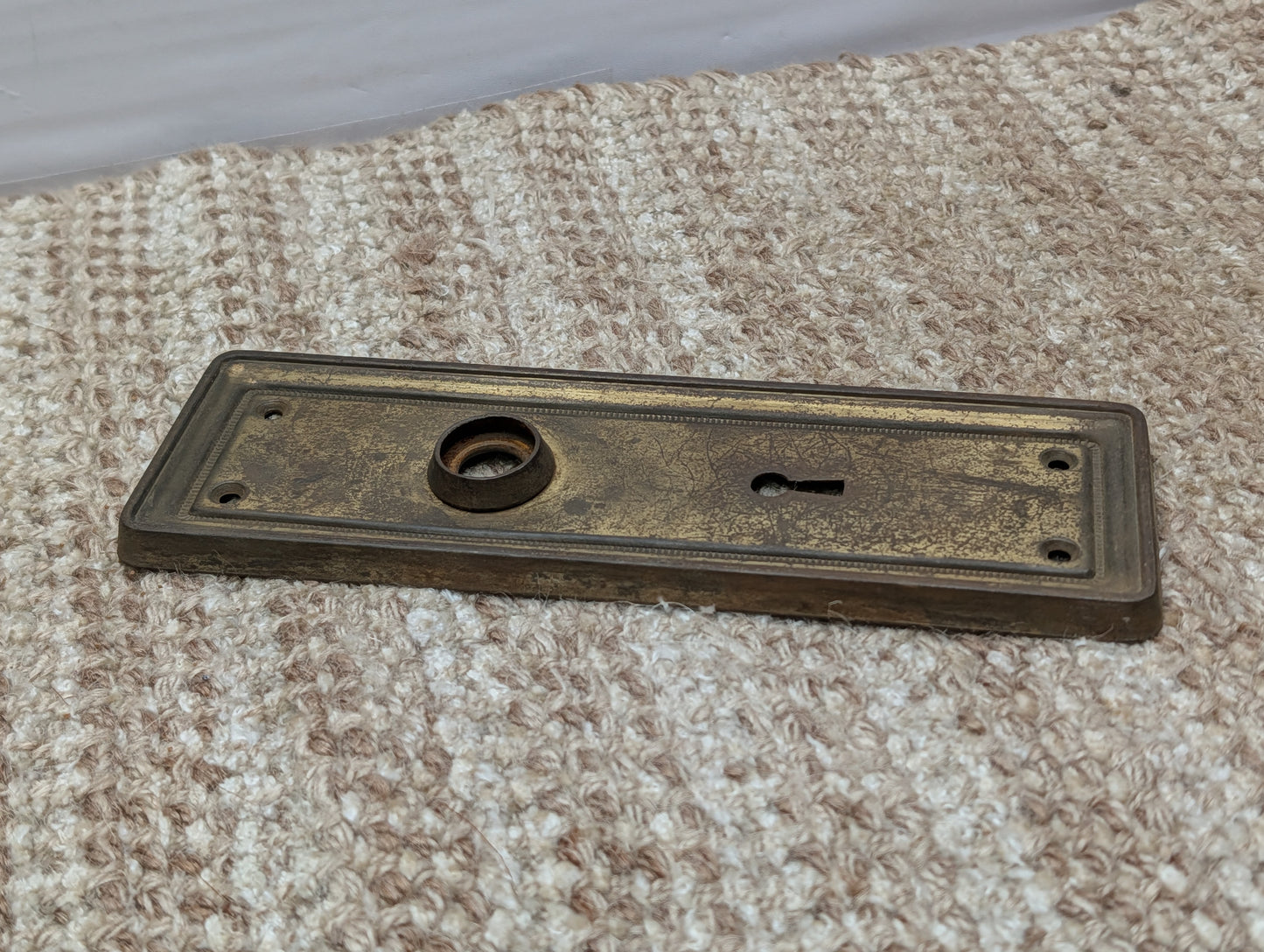 2 9/16" x 7 3/4" Antique Brass Plated Stamped Steel Door Knob Plate