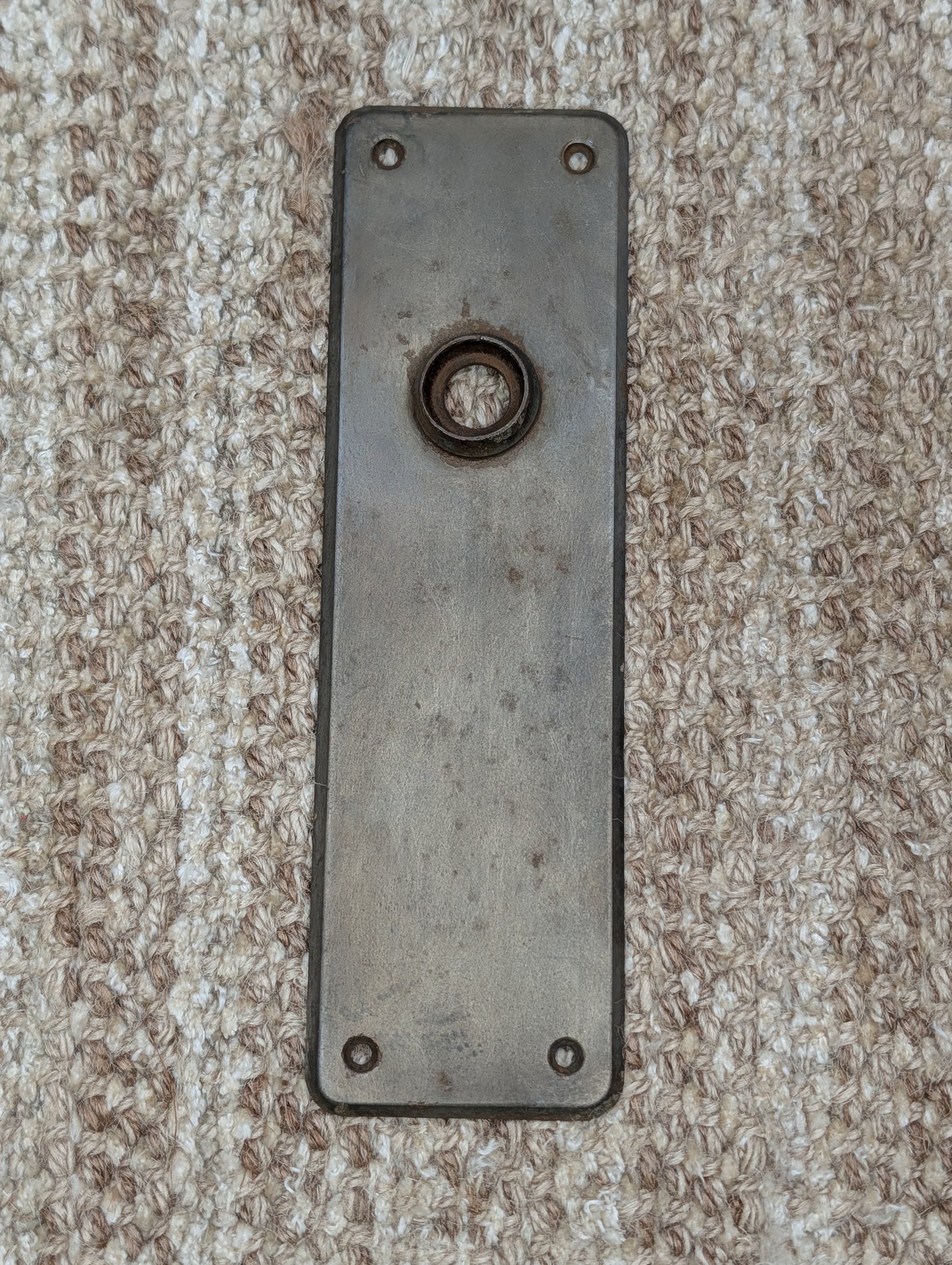 2 3/8" x 7 15/16" Antique Stamped Steel Door Knob Plate
