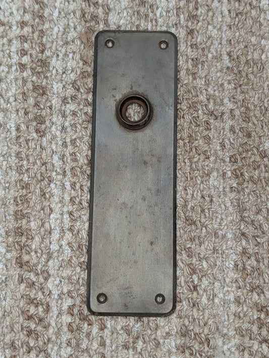 2 3/8" x 7 15/16" Antique Stamped Steel Door Knob Plate