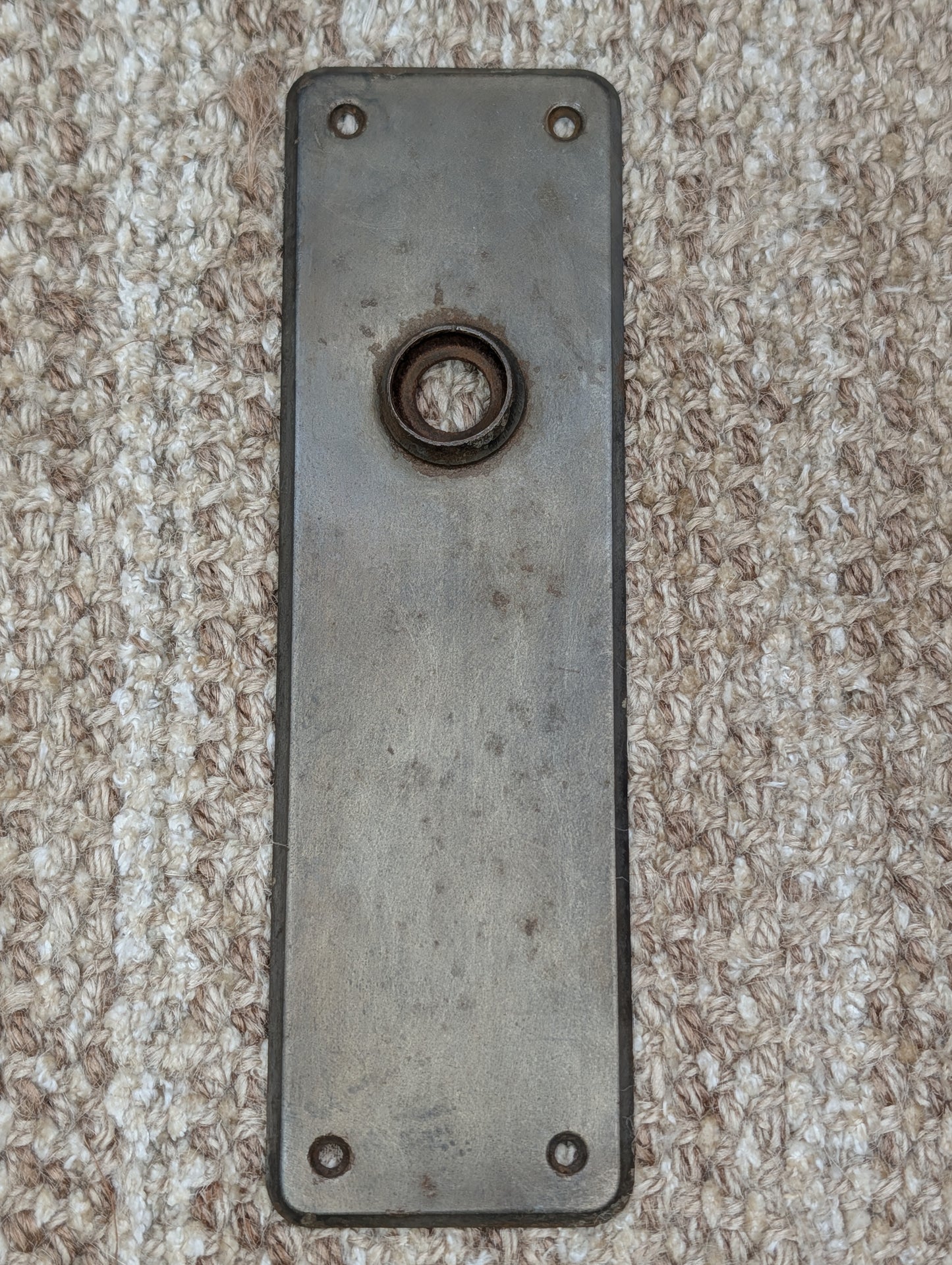 2 3/8" x 7 15/16" Antique Stamped Steel Door Knob Plate