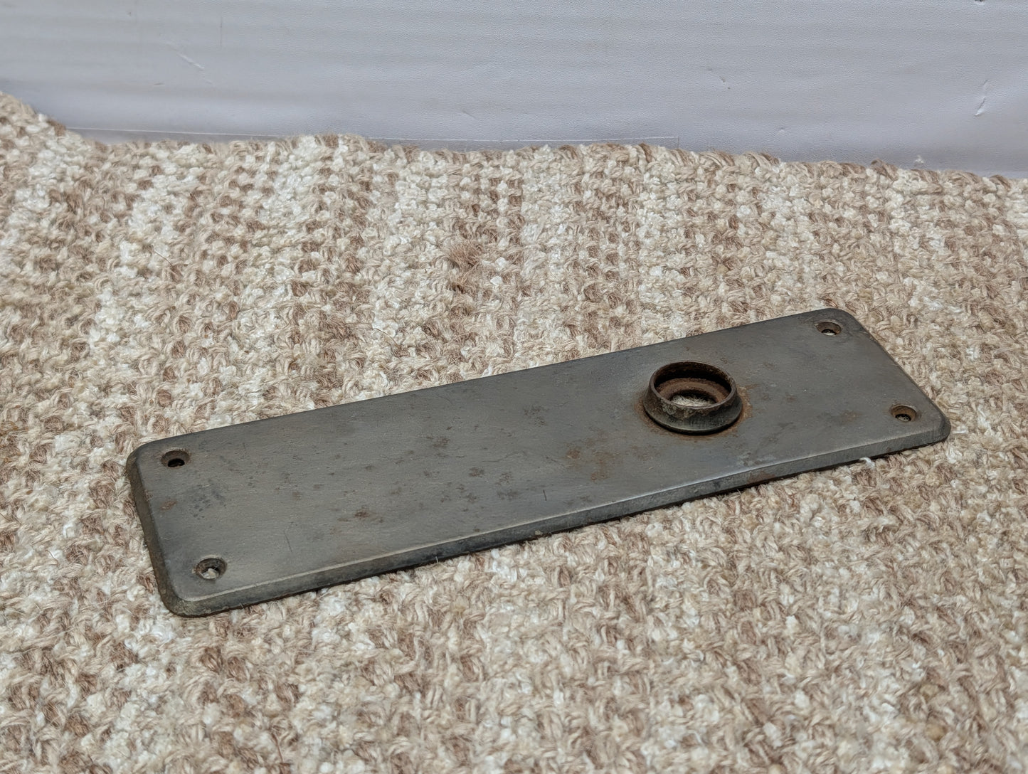 2 3/8" x 7 15/16" Antique Stamped Steel Door Knob Plate