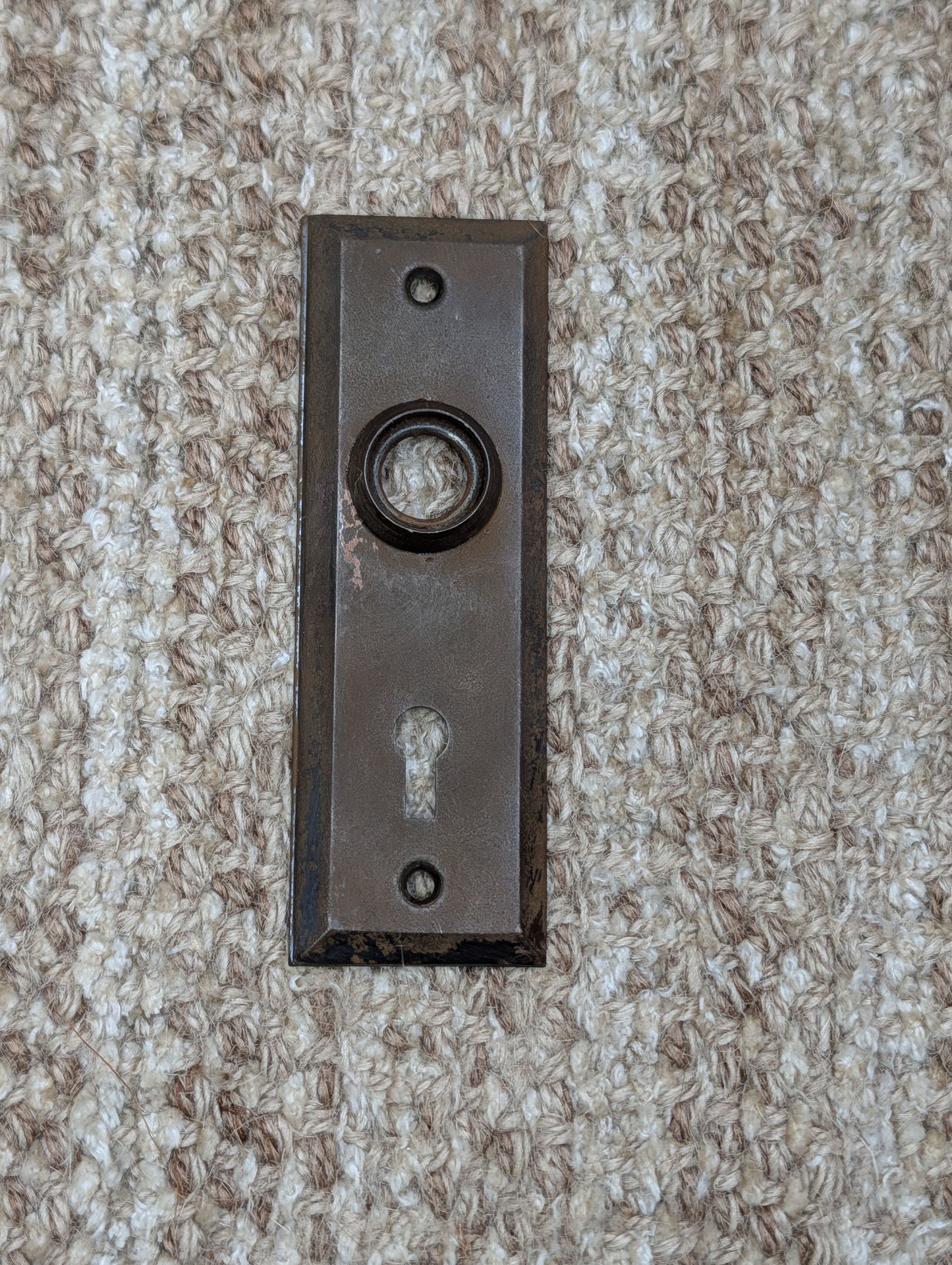 1 1/2" x 4 1/2" Antique Stamped Steel Door Knob Plate