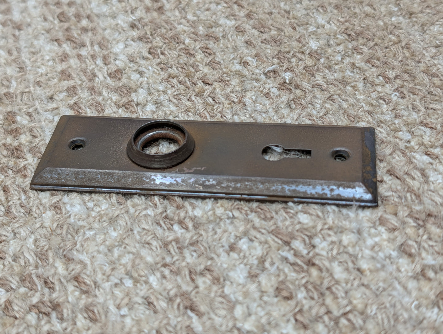 1 1/2" x 4 1/2" Antique Stamped Steel Door Knob Plate