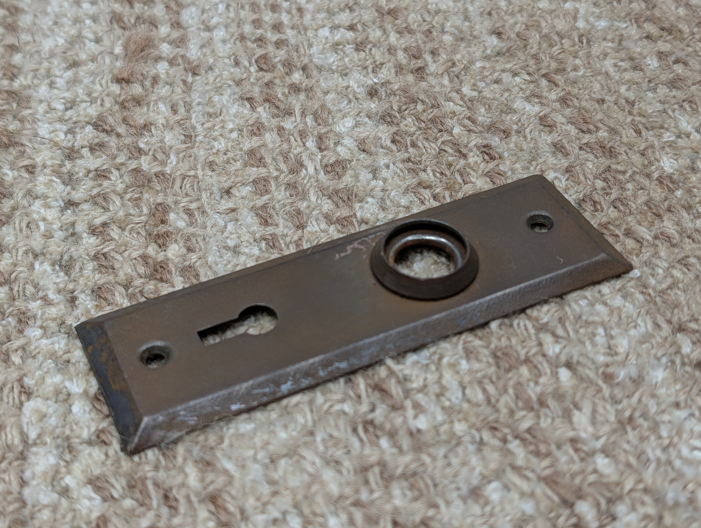 1 1/2" x 4 1/2" Antique Stamped Steel Door Knob Plate