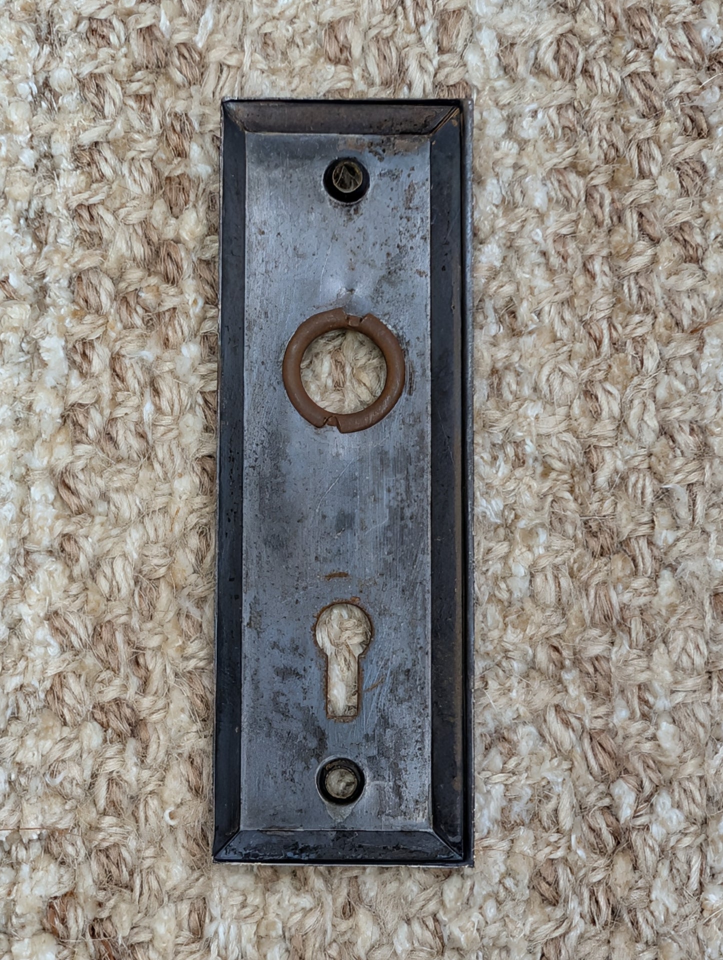 1 1/2" x 4 1/2" Antique Stamped Steel Door Knob Plate
