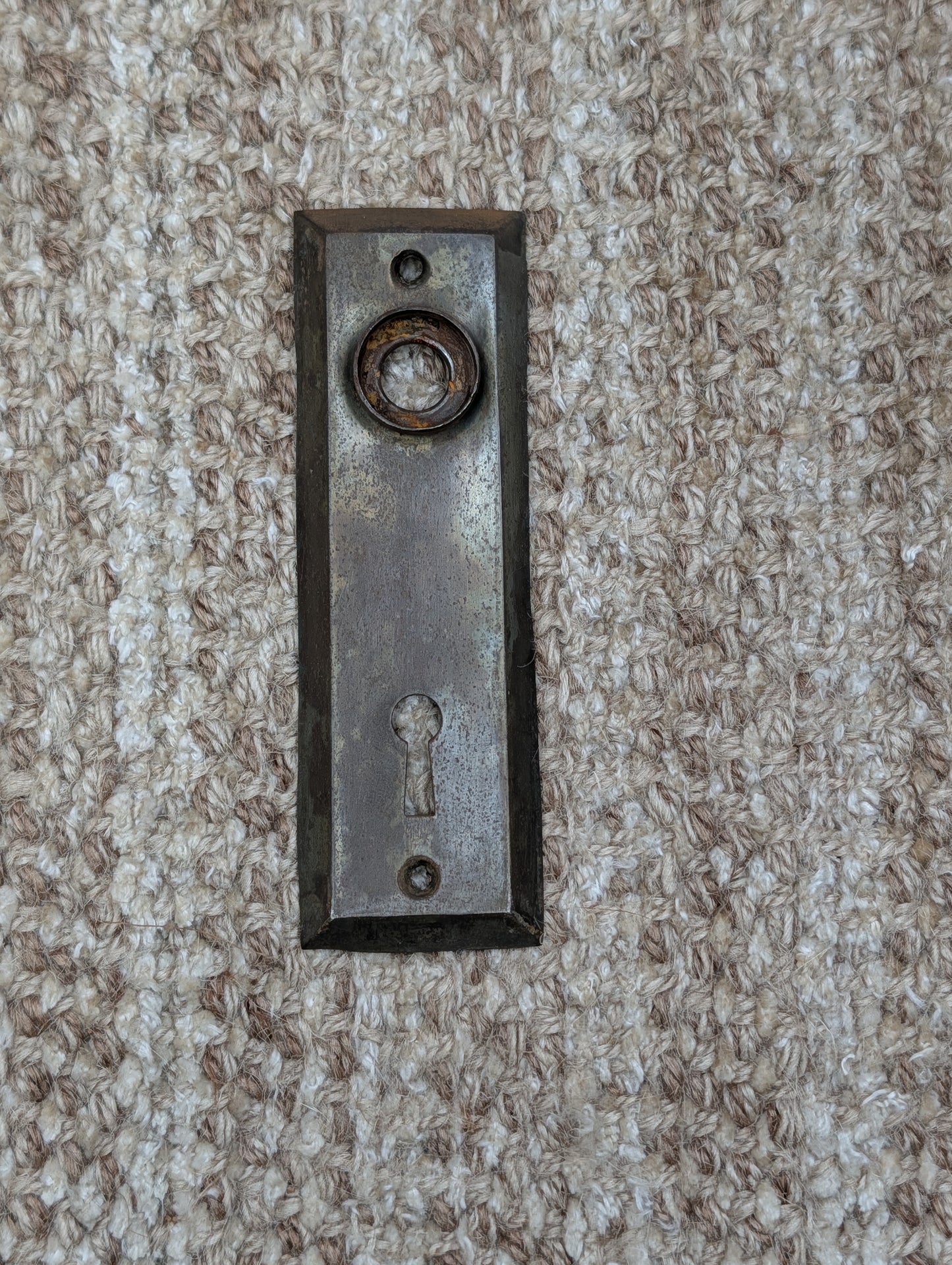 1 1/2" x 4 13/16" Antique Stamped Steel Door Knob Plate