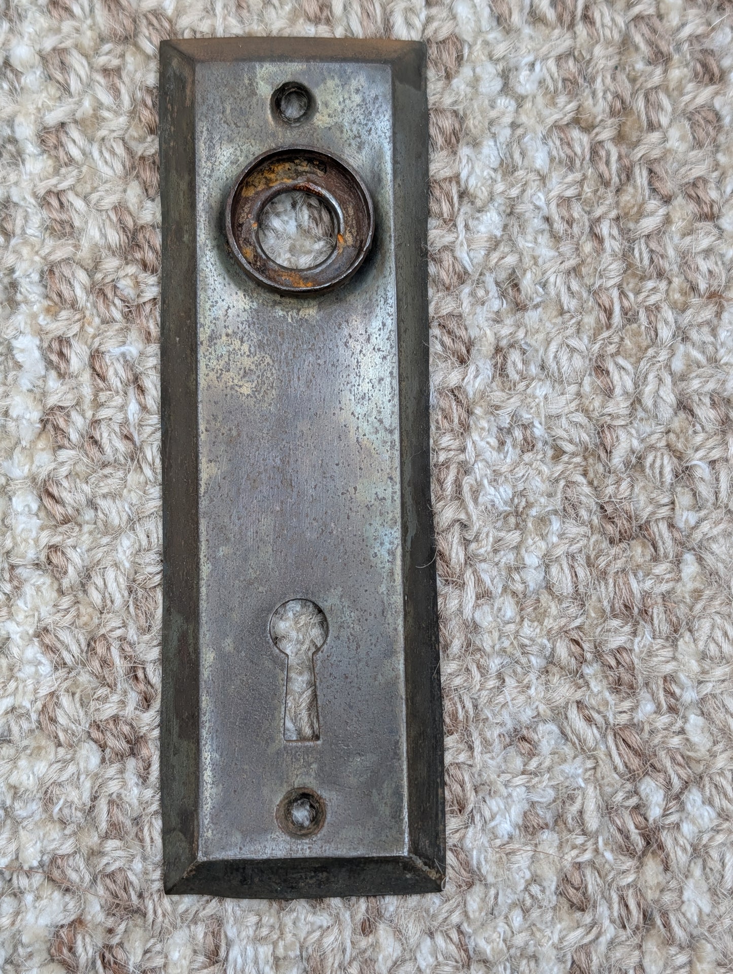 1 1/2" x 4 13/16" Antique Stamped Steel Door Knob Plate