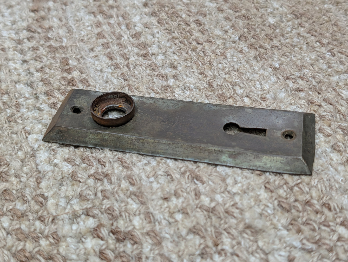 1 1/2" x 4 13/16" Antique Stamped Steel Door Knob Plate