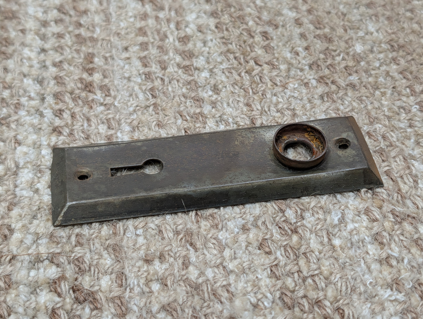 1 1/2" x 4 13/16" Antique Stamped Steel Door Knob Plate