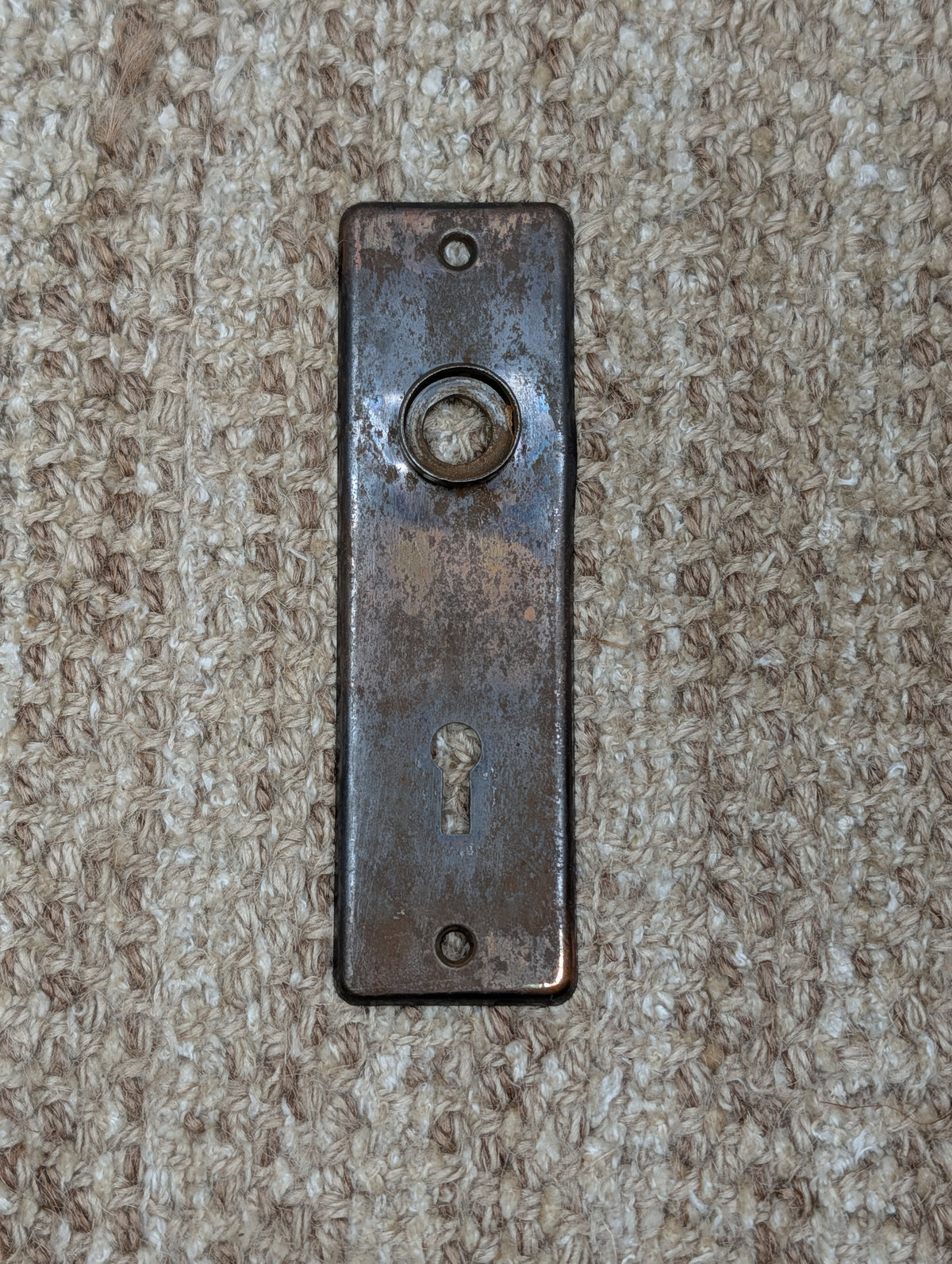 1 5/8" x 5 1/2" Antique Stamped Steel Door Knob Plate