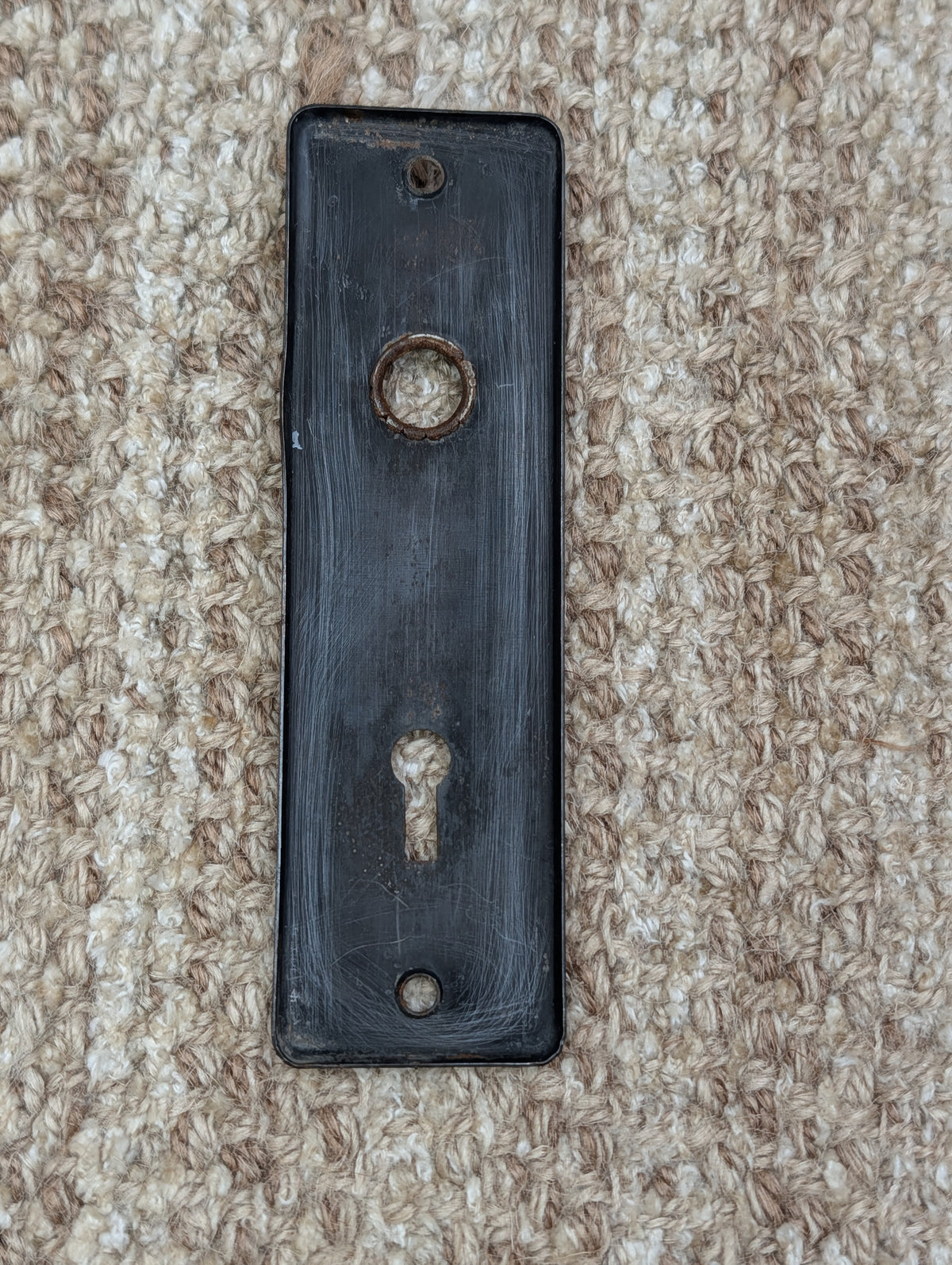 1 5/8" x 5 1/2" Antique Stamped Steel Door Knob Plate