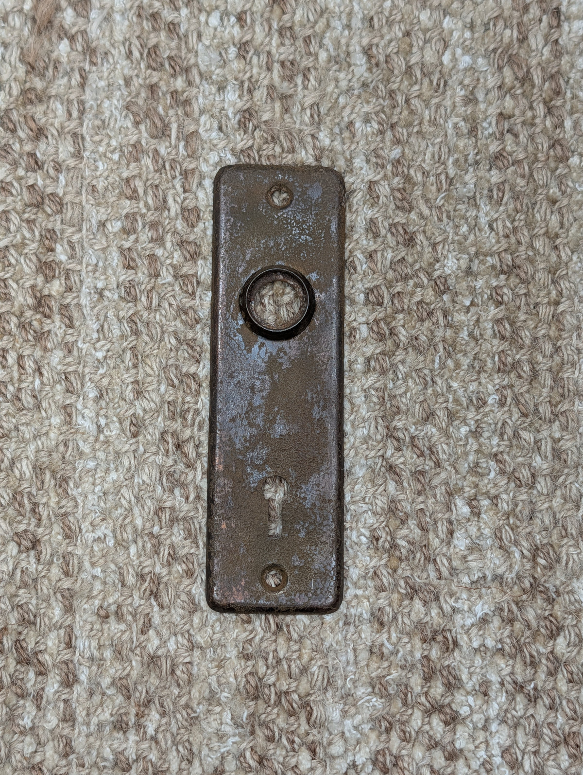 1 5/8" x 5 3/8" Antique Stamped Steel Door Knob Plate