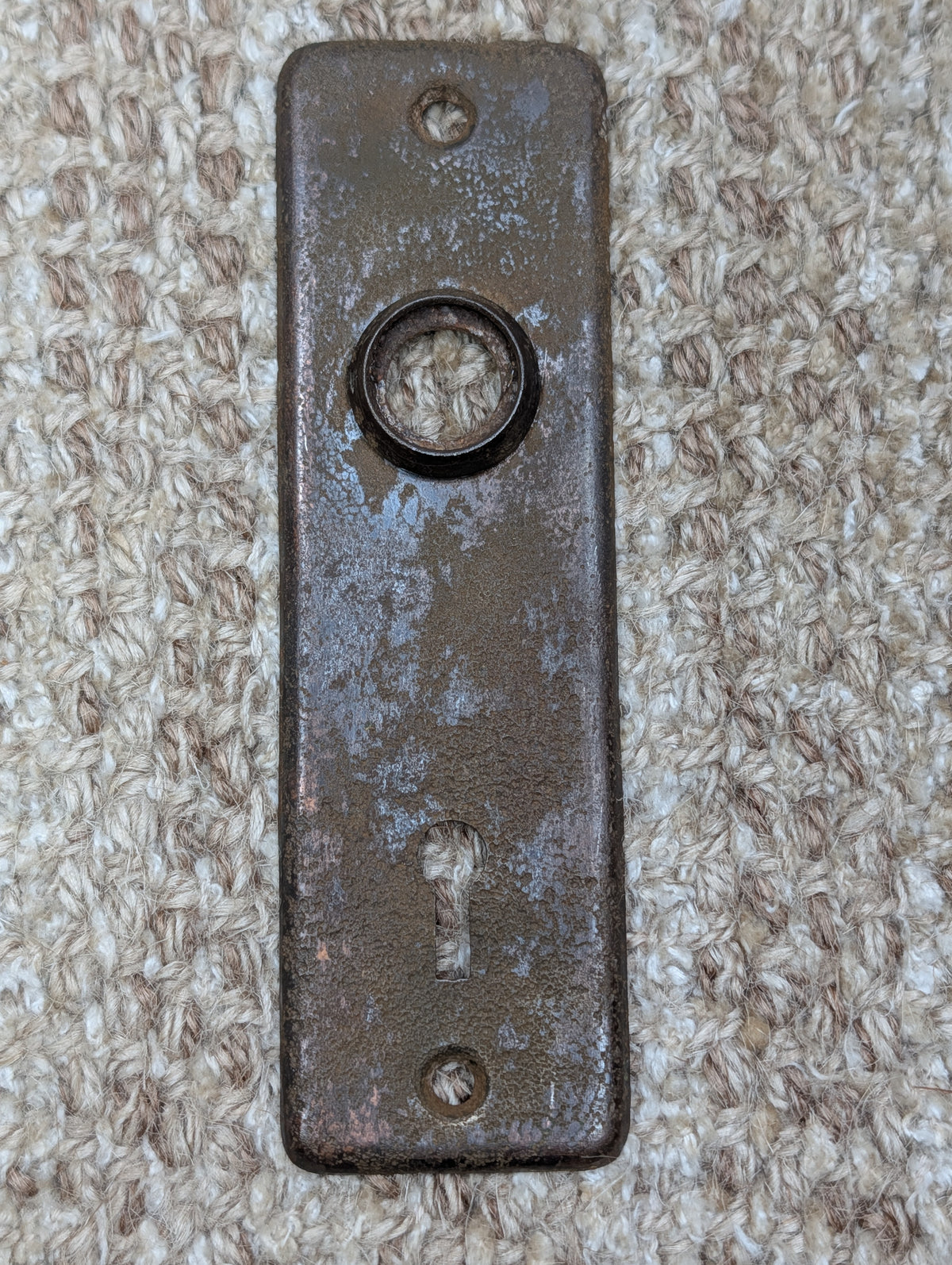 1 5/8" x 5 3/8" Antique Stamped Steel Door Knob Plate