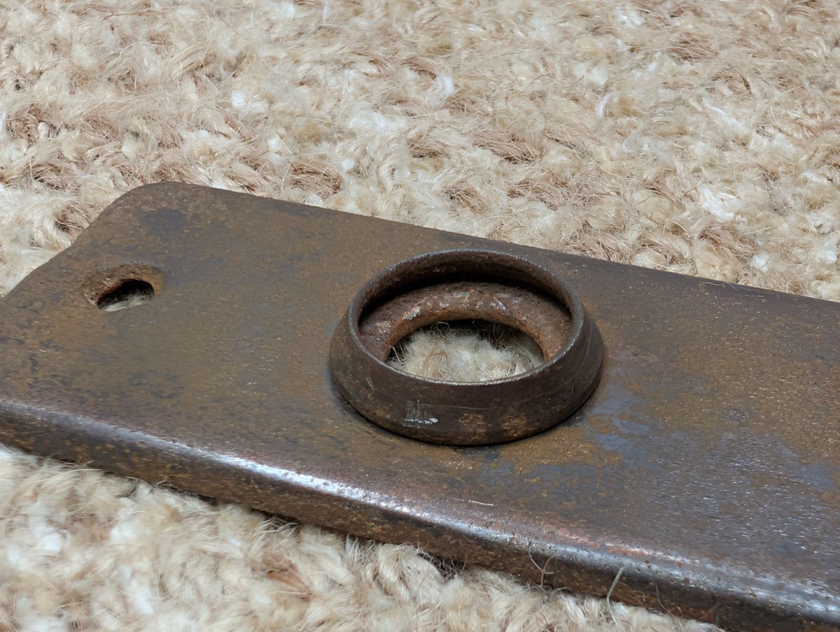 1 5/8" x 5 3/8" Antique Stamped Steel Door Knob Plate
