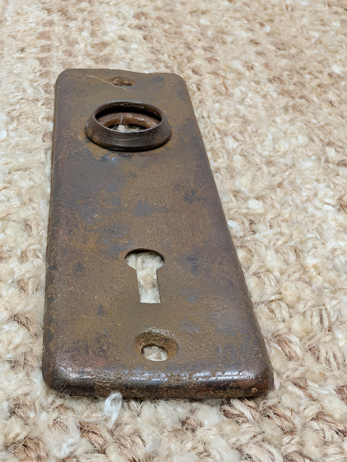 1 5/8" x 5 3/8" Antique Stamped Steel Door Knob Plate