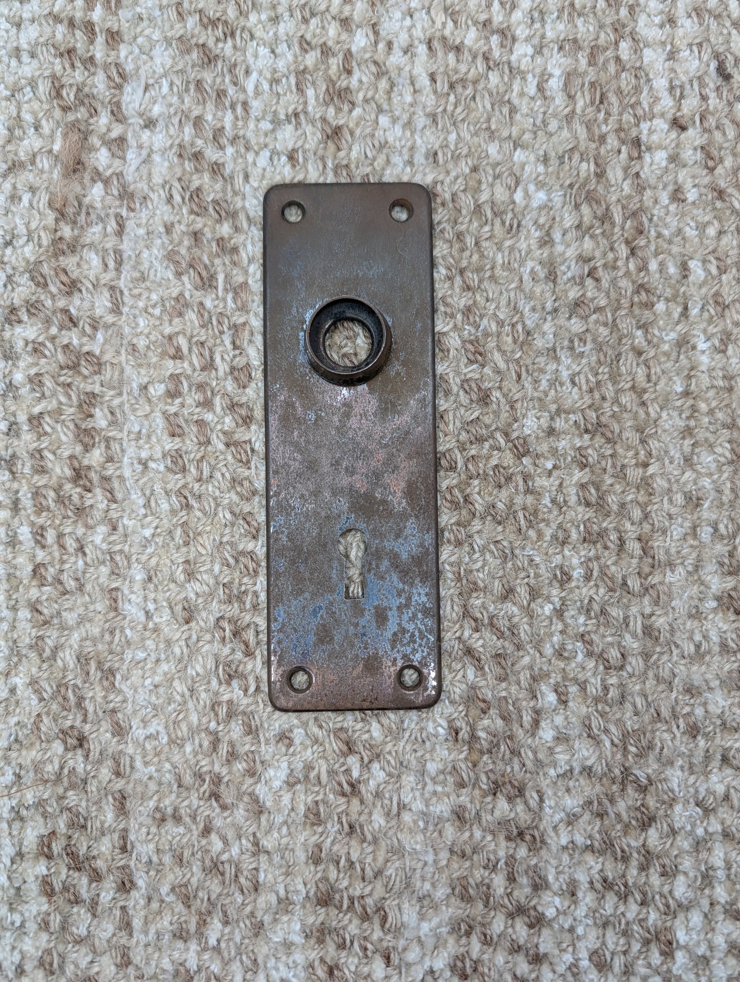 1 13/16" x 5 11/16" Antique Stamped Steel Door Knob Plate