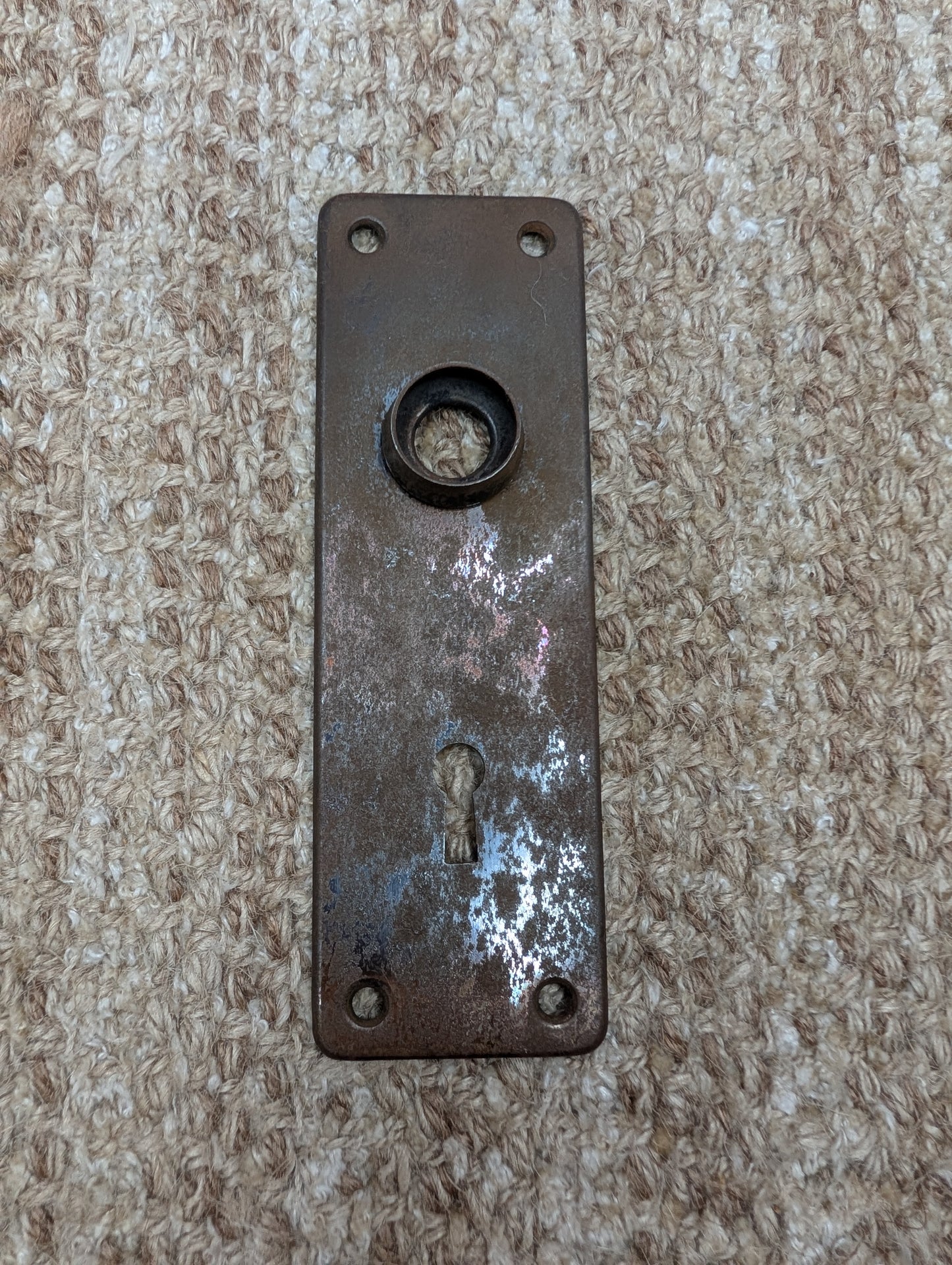 1 13/16" x 5 11/16" Antique Stamped Steel Door Knob Plate